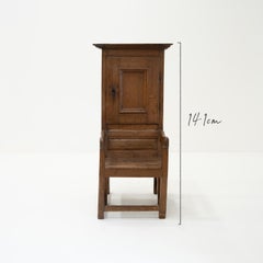 Late 19th Century Oak Porters Chair with attached Cupboard and Shelf behind