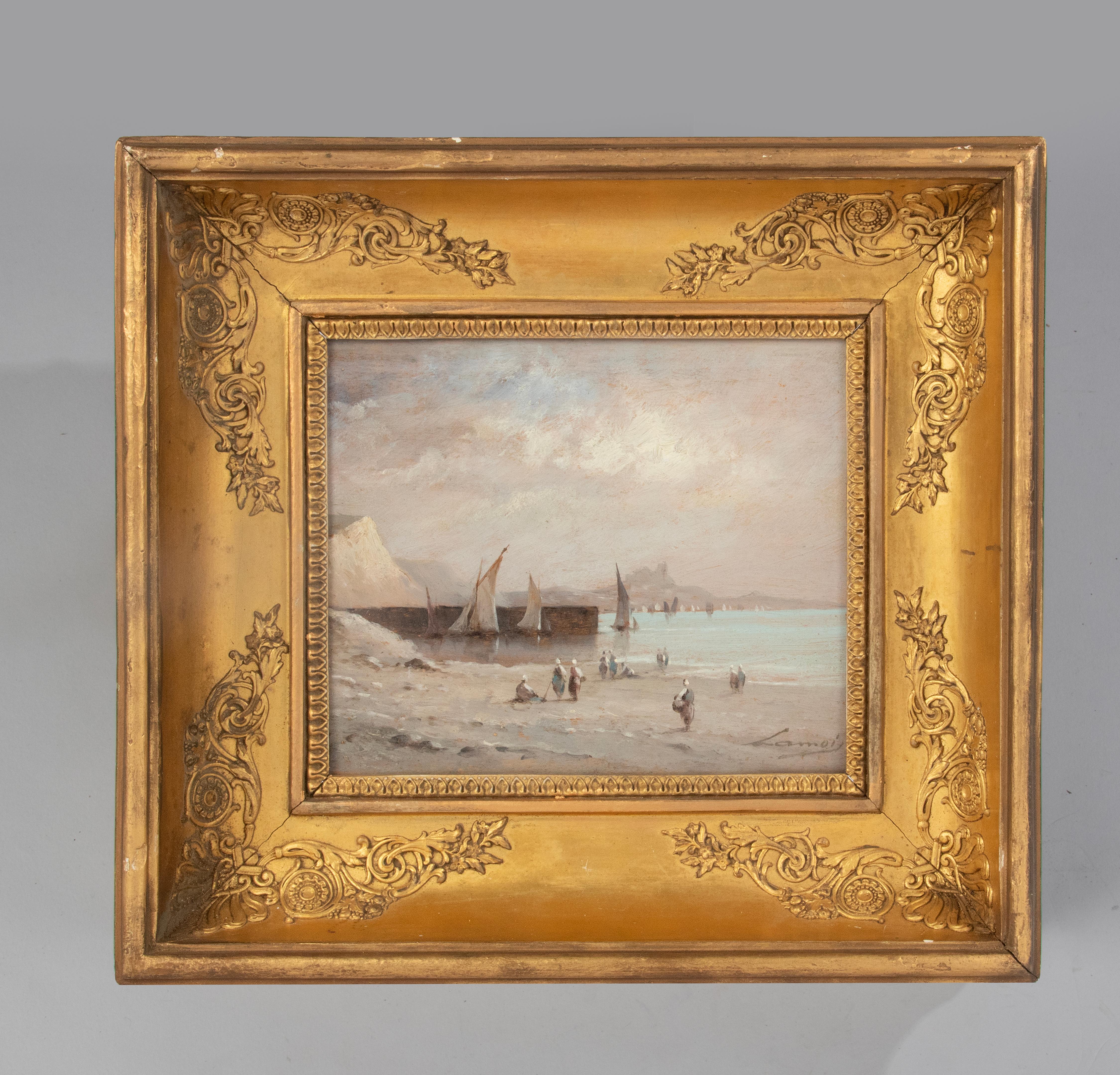 A finely painted seascape with fishing boats. The fishermen's wives waited on the beach to help their husbands. Paintd on a walnut panel. Signed lower right; Lamoi. In an gilt wooden frame in Charles X style. Information about the painter is