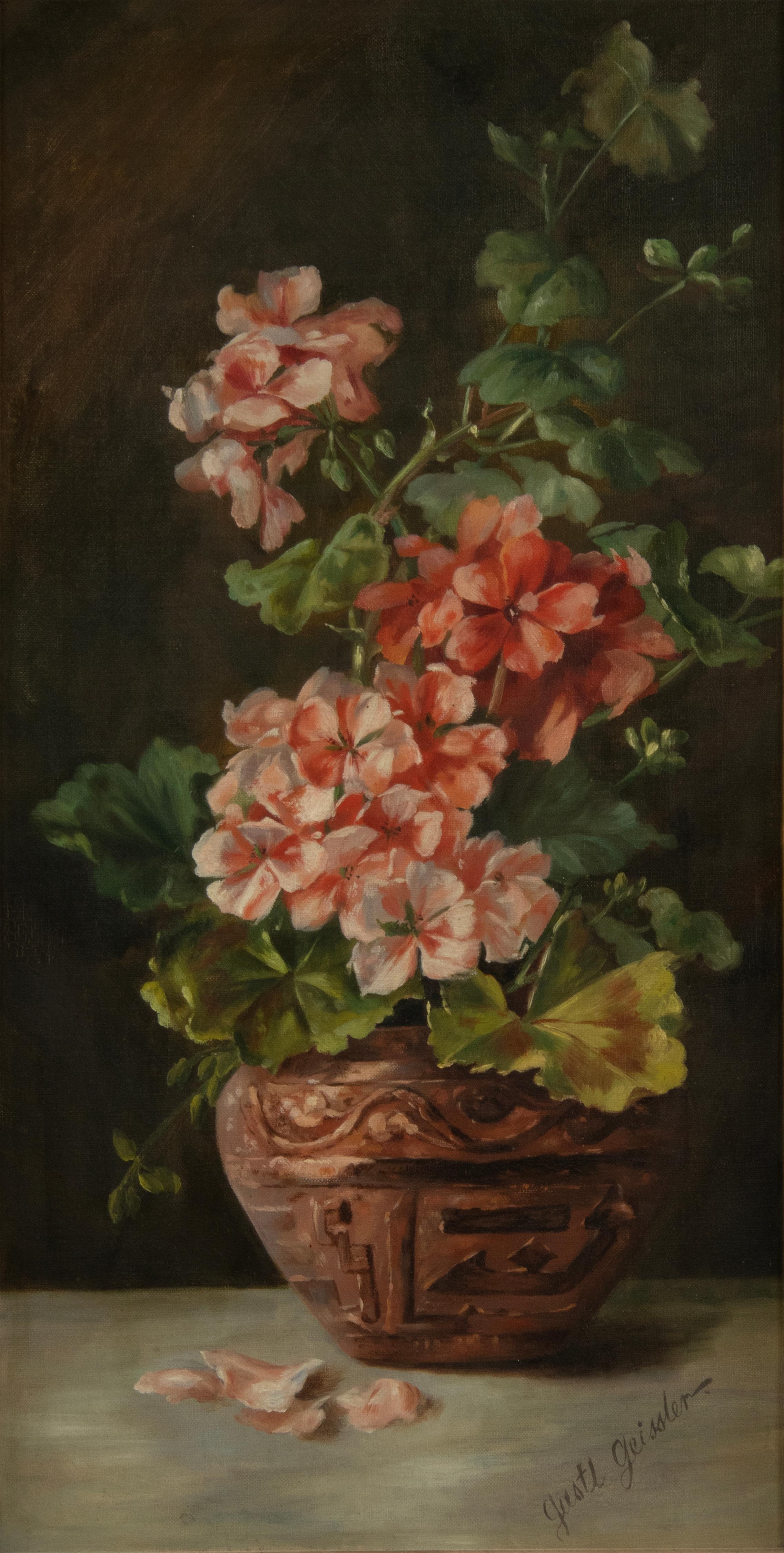 An antique flower stil life oil painting, depicting geranium flowers in a ceramic vase. Signed right under: Gustl Geissler. Painted on canvas. In a beautiful gesso gold leaf frame, with acorns and oak leaf. The canvas and paint are in good