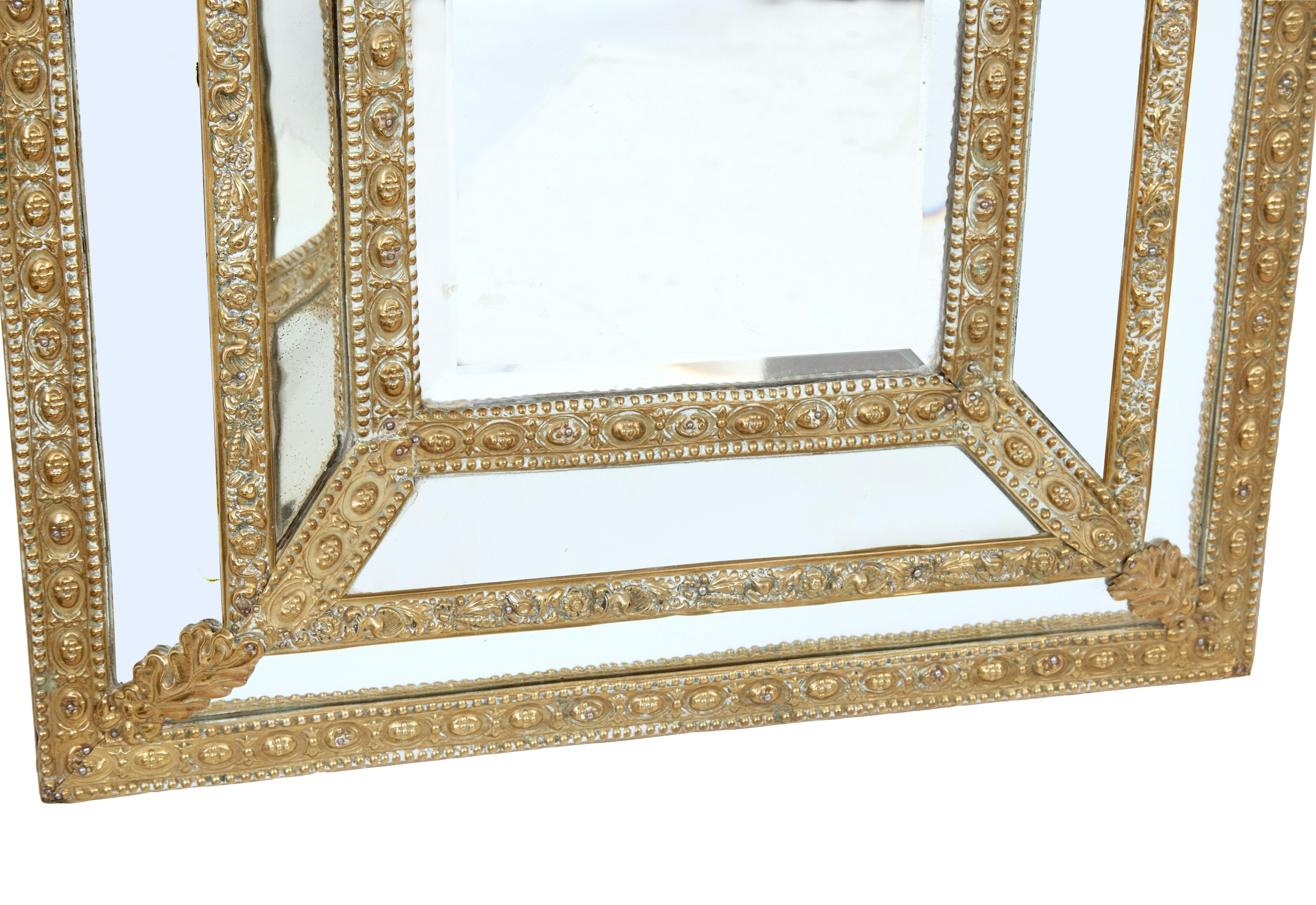 ornate brass mirror