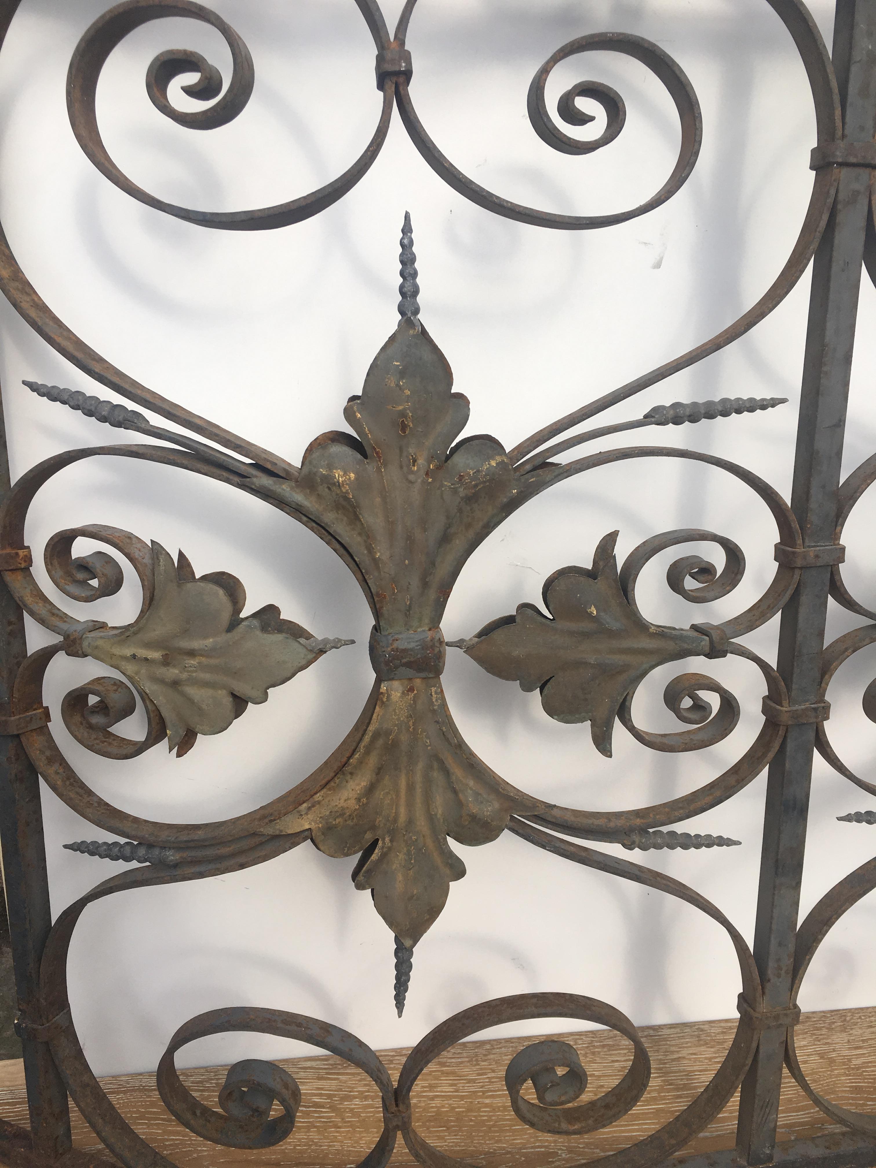 Late 19th century hand crafted iron grilles or balcony railing from the Monte Carlo estate of Aristotle Onassis in the style of Victor Horta. This ornate balcony railing features beautiful feuilles acanthe motifs on both sides elegant swirls and