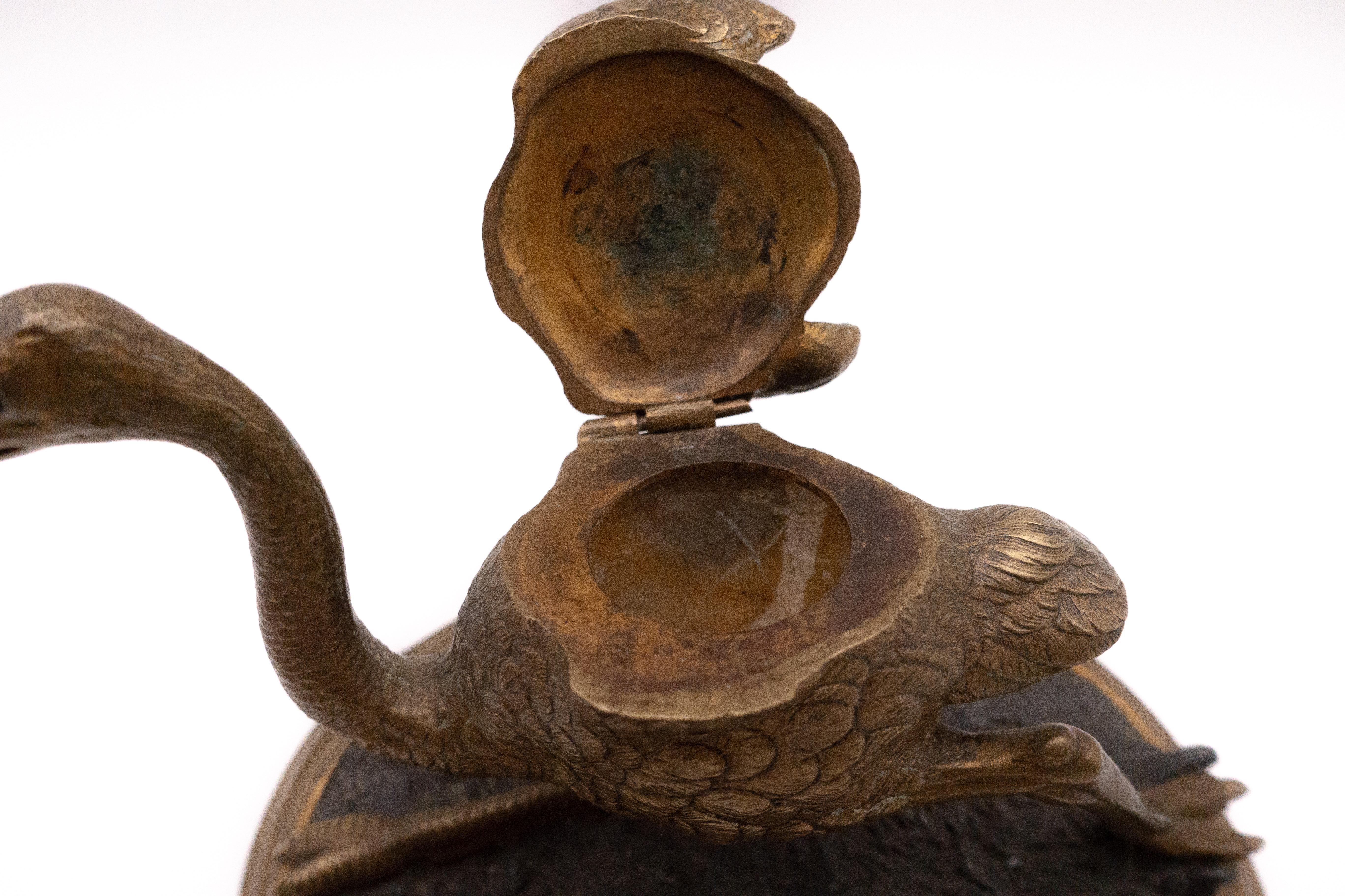 English Late 19th Century Ostrich in Motion Inkwell with Ruby Colored Eyes