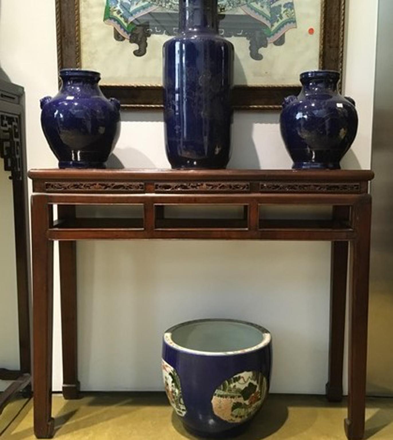 Pair of elmwood consoles coming from Eastern China, finely handcrafted in the late 19th century. Two timeless elegance pieces, easy to place in an entry way, or to the side of the fireplace. Useful their thin depth.
Top in solid elmwood too.
Not