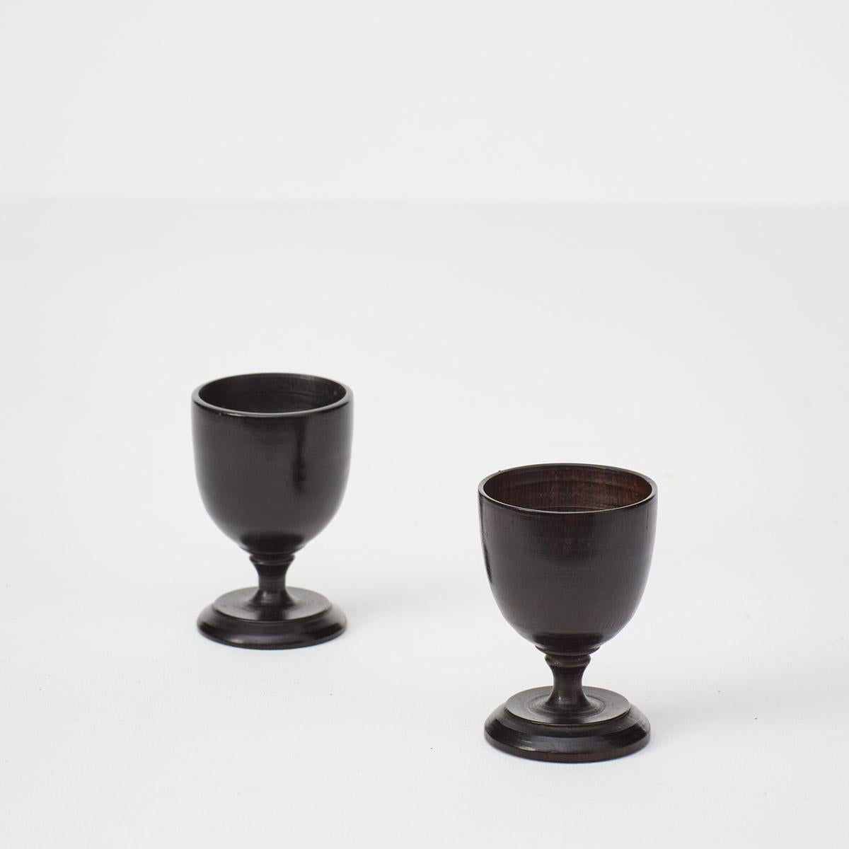 19th Century Late 19th century pair of antique ebonised egg cups, UK For Sale