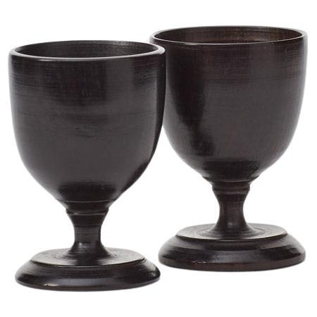 Late 19th century pair of antique ebonised egg cups, UK For Sale