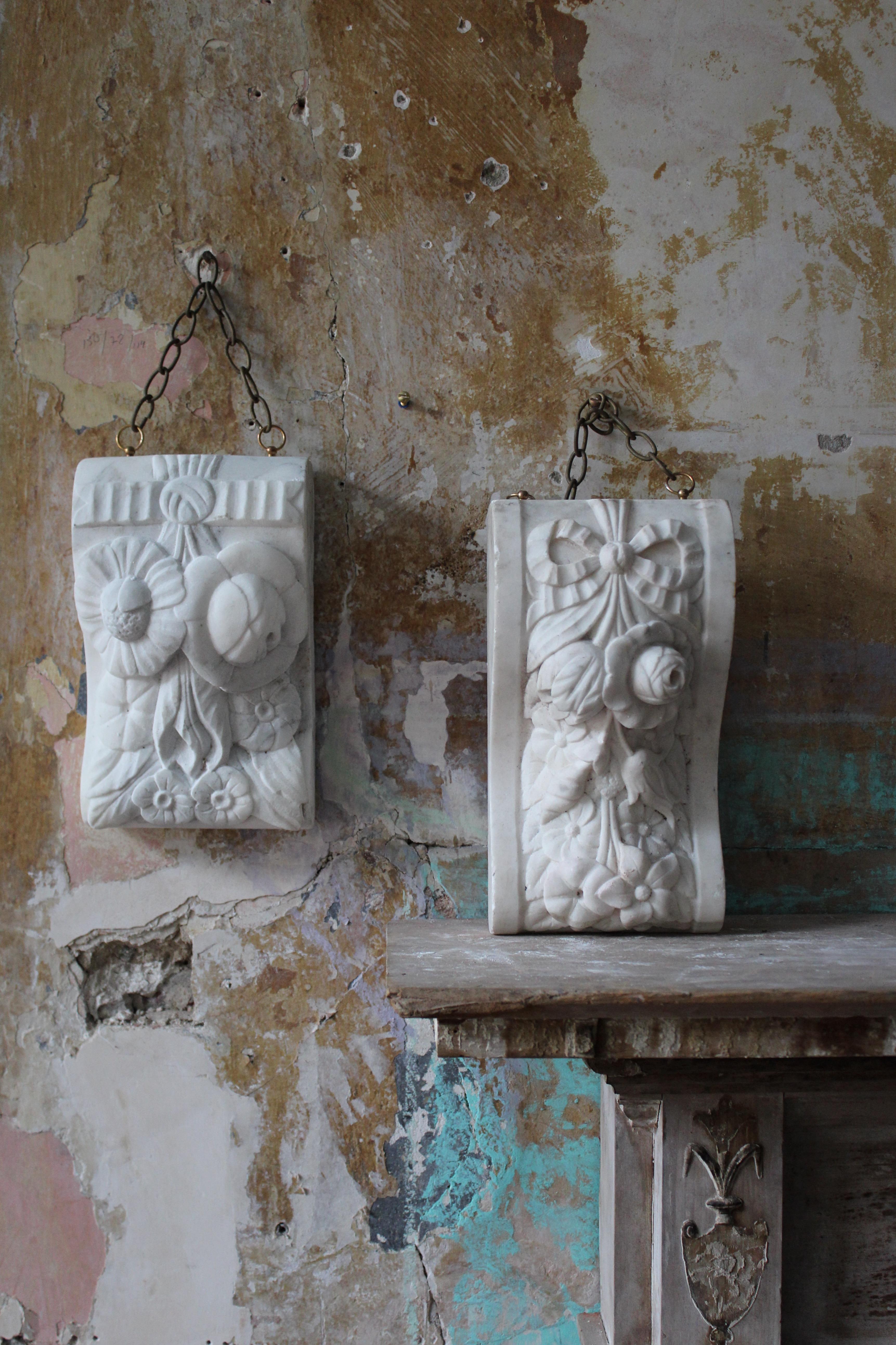 late 19th century pair of hand carved marble corbels both with similar organic following decorations and previously part of larger interior architectural feature or fireplace

The sections are extremely well carved, crisp and have a good decorative