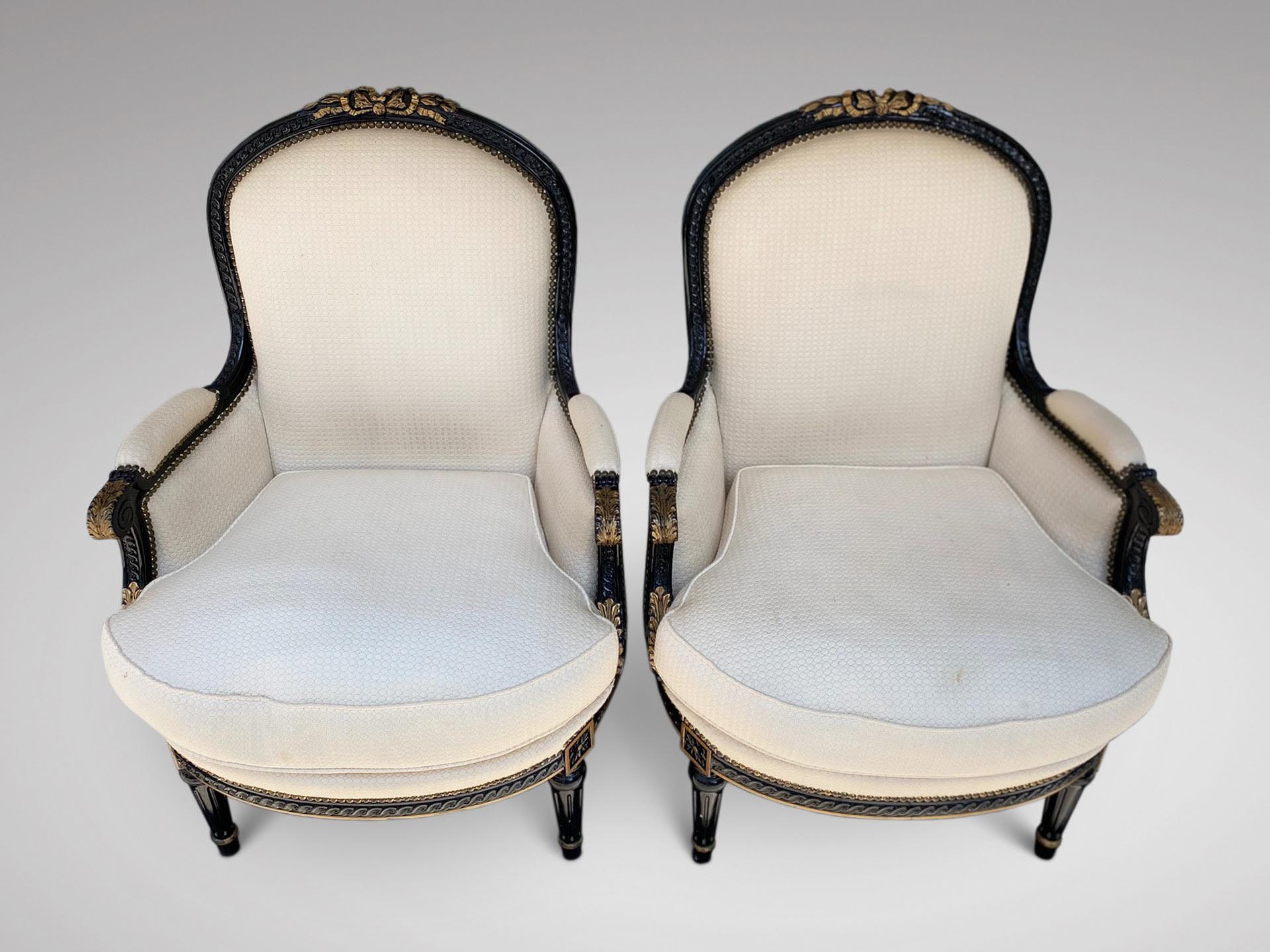 Louis XVI Late 19th Century Pair of French Black and Gilded Bergères Armchairs
