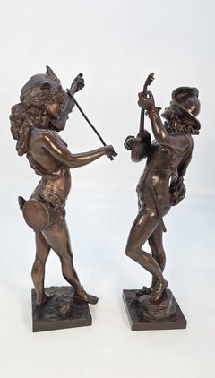 Late 19th century pair of French bronze harlequin figures by Alfred Grevin C1870