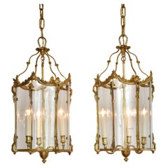 Late 19th century pair of French gilded lanterns in the style of Louis XV