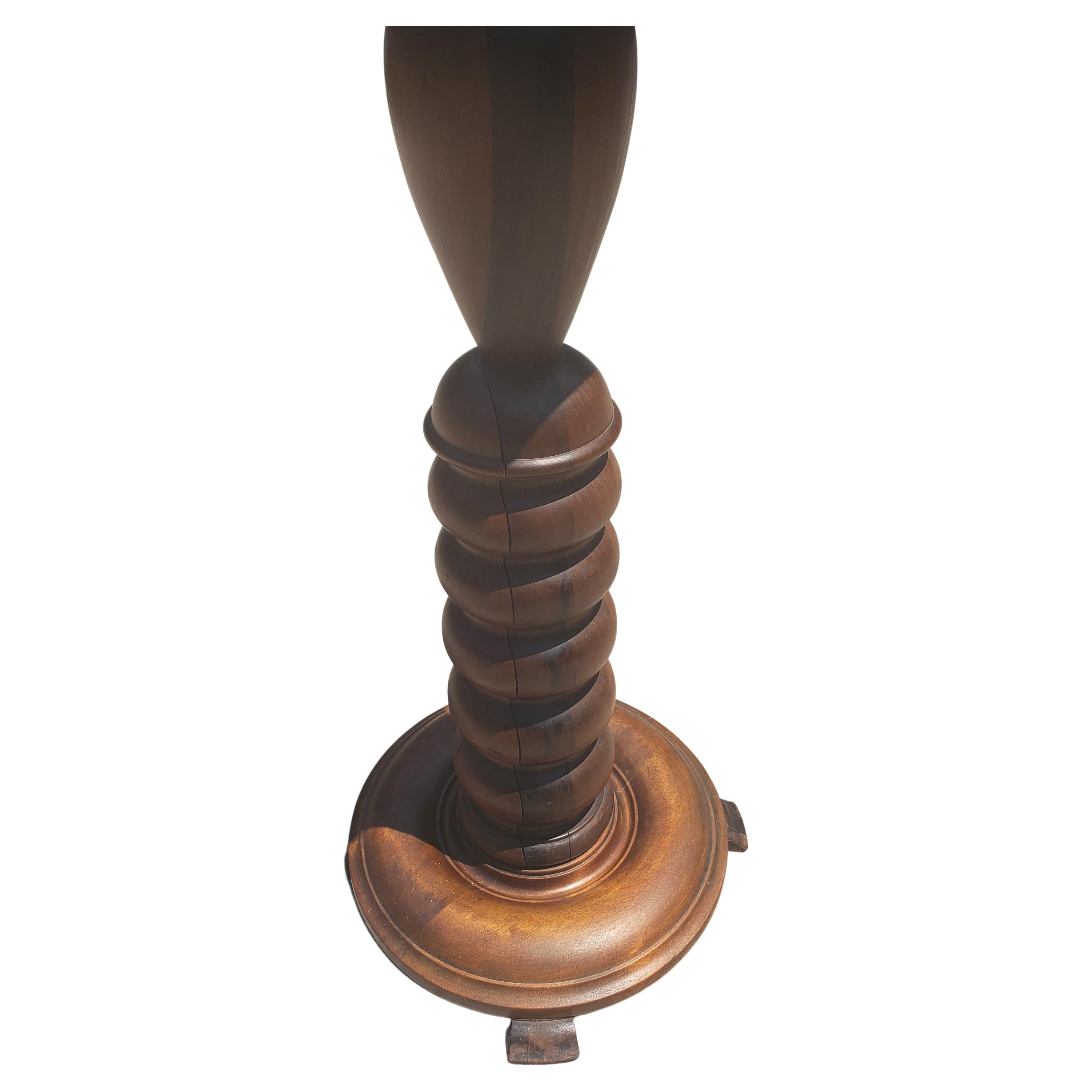 A late Victorian period patinated Mahogany Pedestal or Plant Stand. Large bobbin turned column.
 