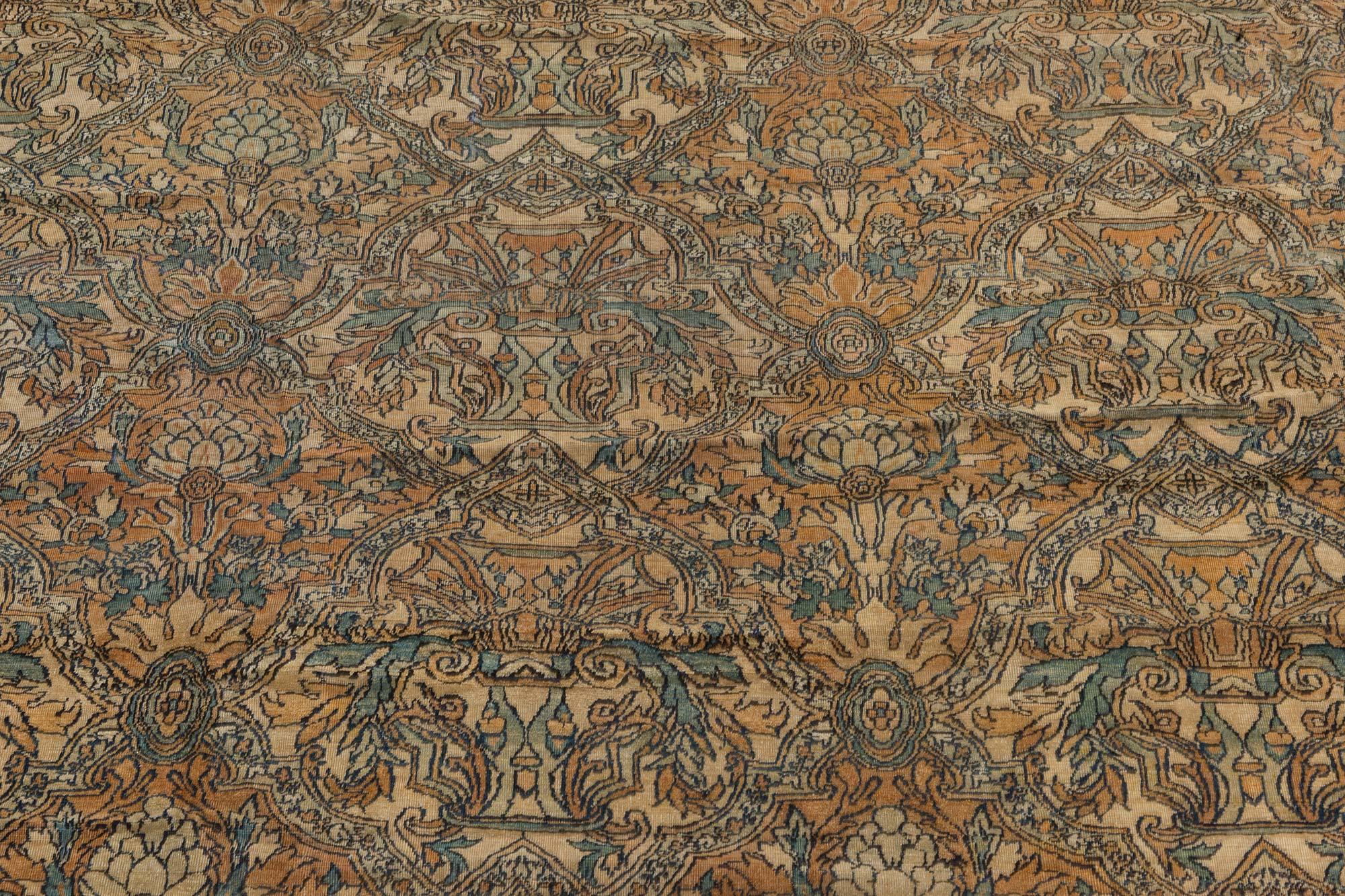 Authentic 19th century Persian Kirman handmade wool rug
Size: 11'9