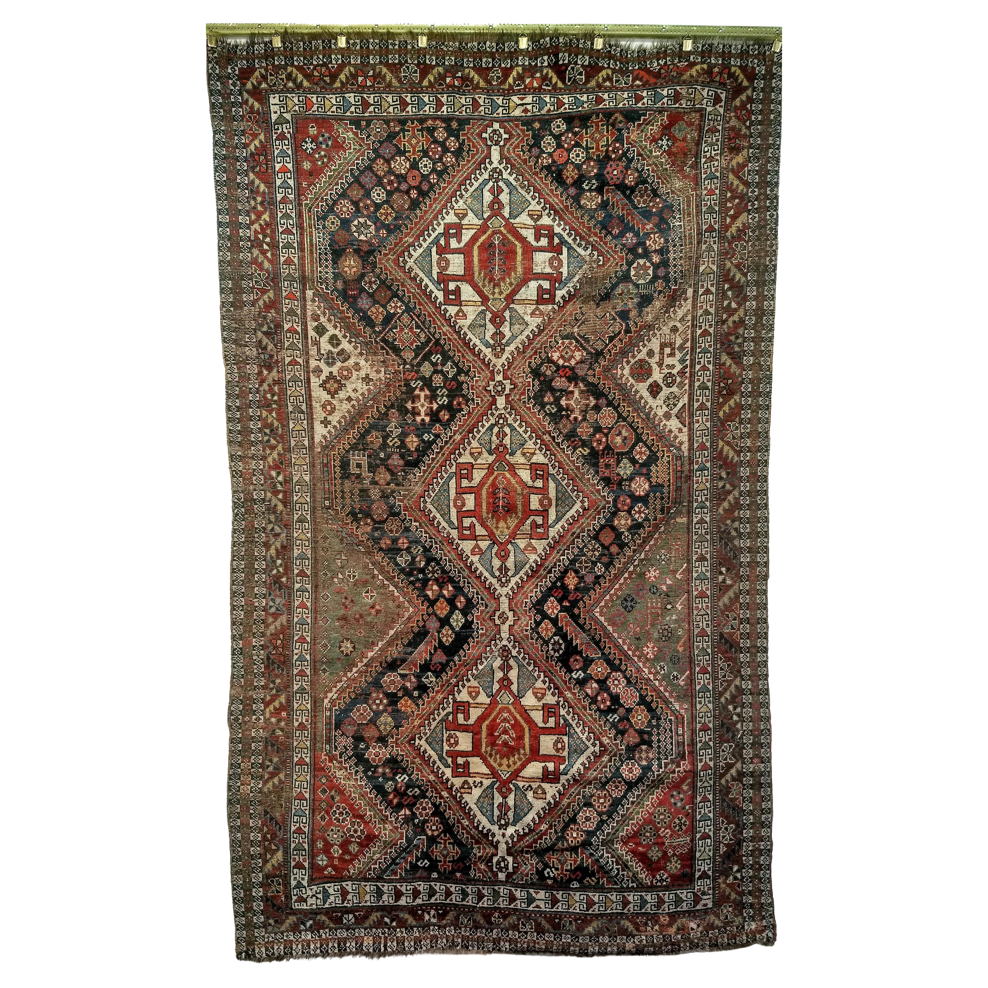 Fin du XIXe siècle - Tapis tribal persan Qashqai dans les tons marine, vert, ivoire et rouge