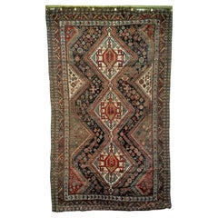 Fin du XIXe siècle - Tapis tribal persan Qashqai dans les tons marine, vert, ivoire et rouge