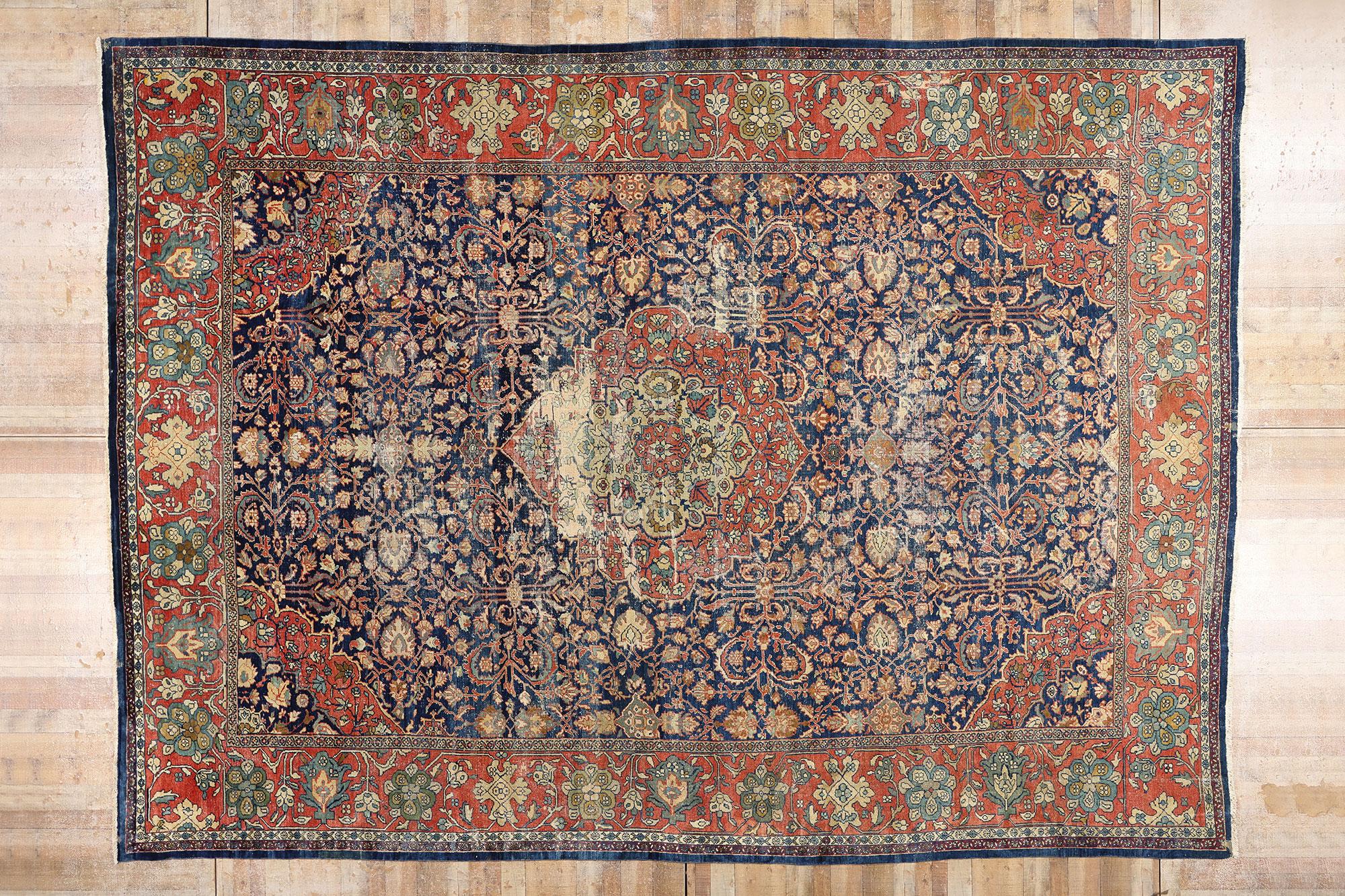 79228 Late 19th Century Distressed Antique Persian Sultanabad Rug, 13'11 x 19'02. Woven in the golden twilight of the 19th century, this hand knotted wool distressed antique Persian Sultanabad rug evokes the grandeur of a fading imperial garden, its