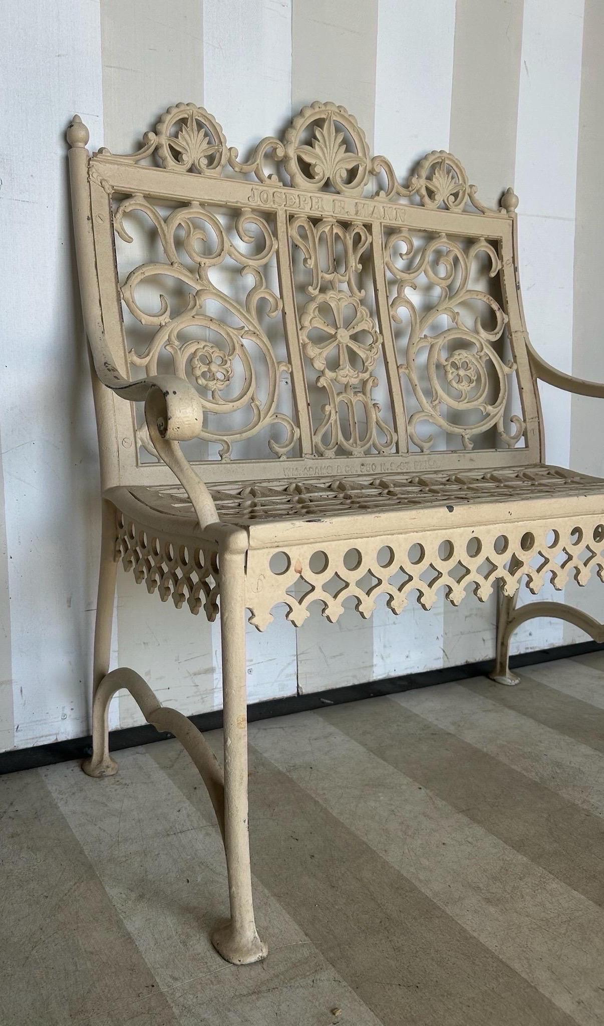 The Joseph H. Mann garden bench- Late 19th Century Philadelphia Cast Iron Bench signed William Adams with Mr. Mann's name cast into the back. Great scale and original paint