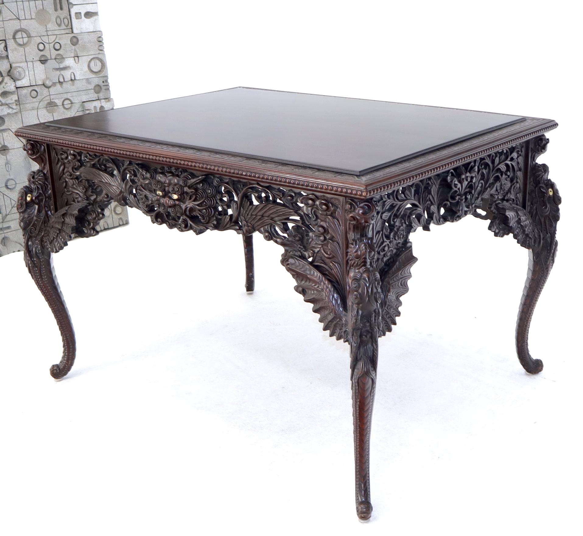 Cherub looking creatures with wing motive solid mahogany Japanese writing table or desk standing on scroll shape legs, circa late 19th century piece. Very good vintage condition.