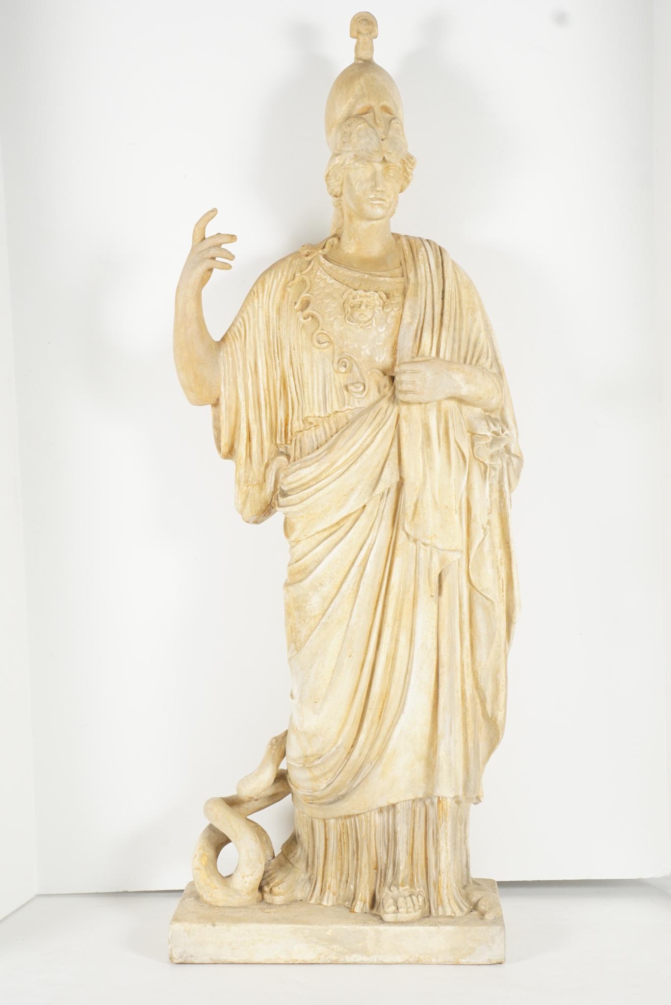 This figure of a somewhat large scale is the Athena Giustiniani. The original greek statue by Pheidias of Pallas Athena is lost but this is a Roman copy of the 5th-early 4th century BCE. This figure most likely a cult image shows at her feet a great