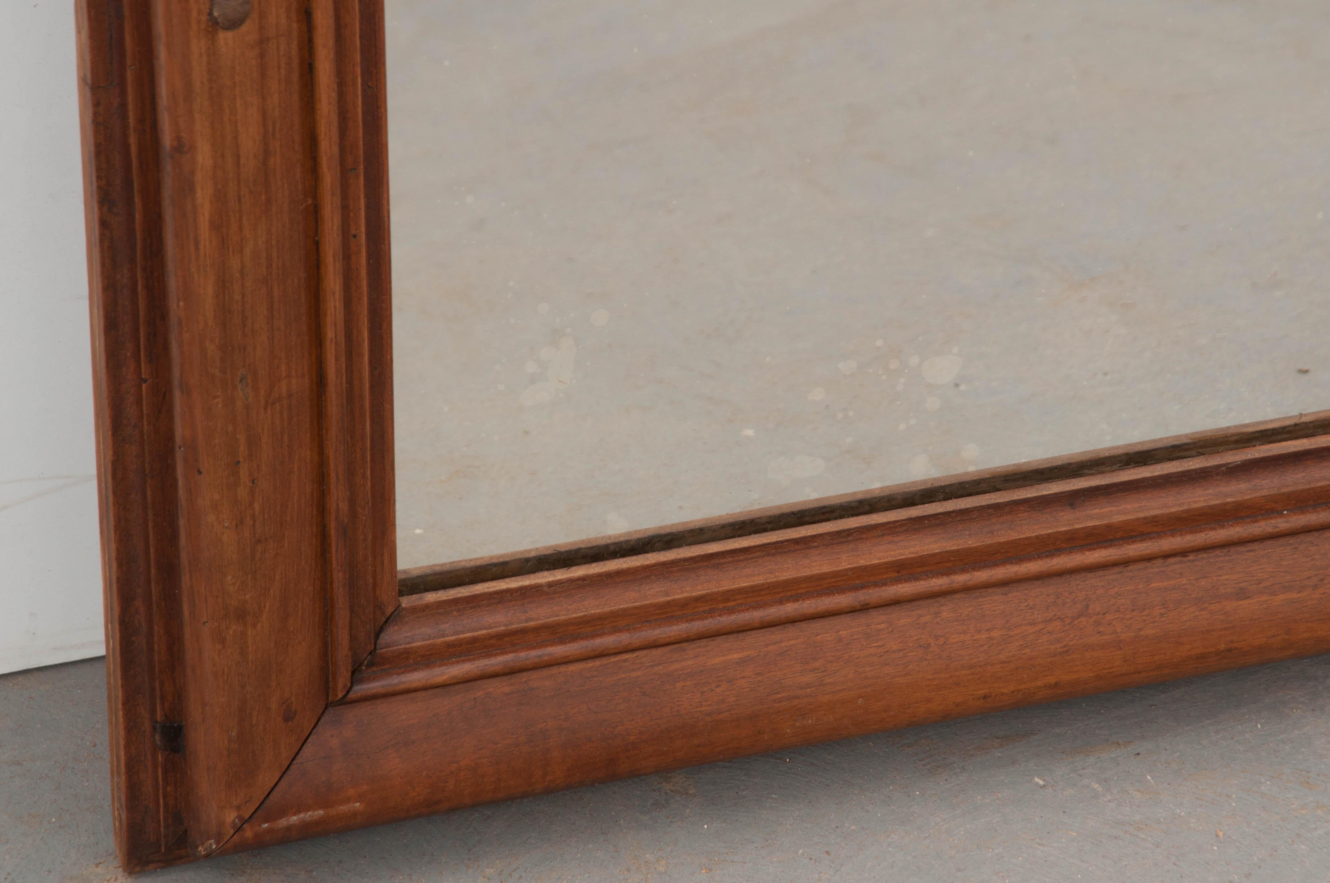 French Late 19th Century Provincial Carved Walnut Mirror For Sale
