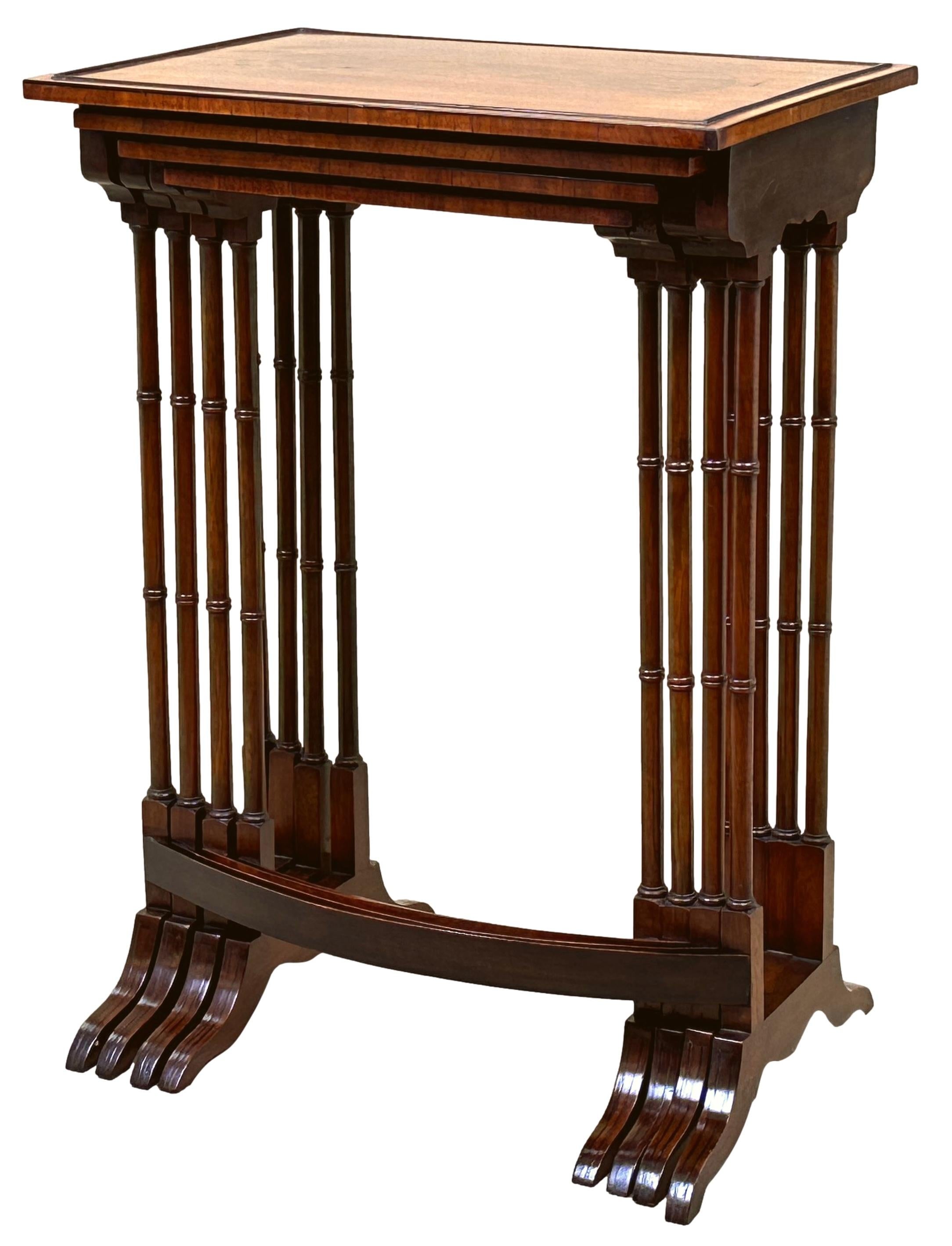 A Fine Quality Late 19th Century Mahogany Quartetto Nest Of Four Coffee Tables, Having Extremely Well Figured Tops With Oval Inlay, Cockbeaded Panelling And Crossbanded Edges, Raised On Elegant Turned Upright Supports With Curved Stretchers And