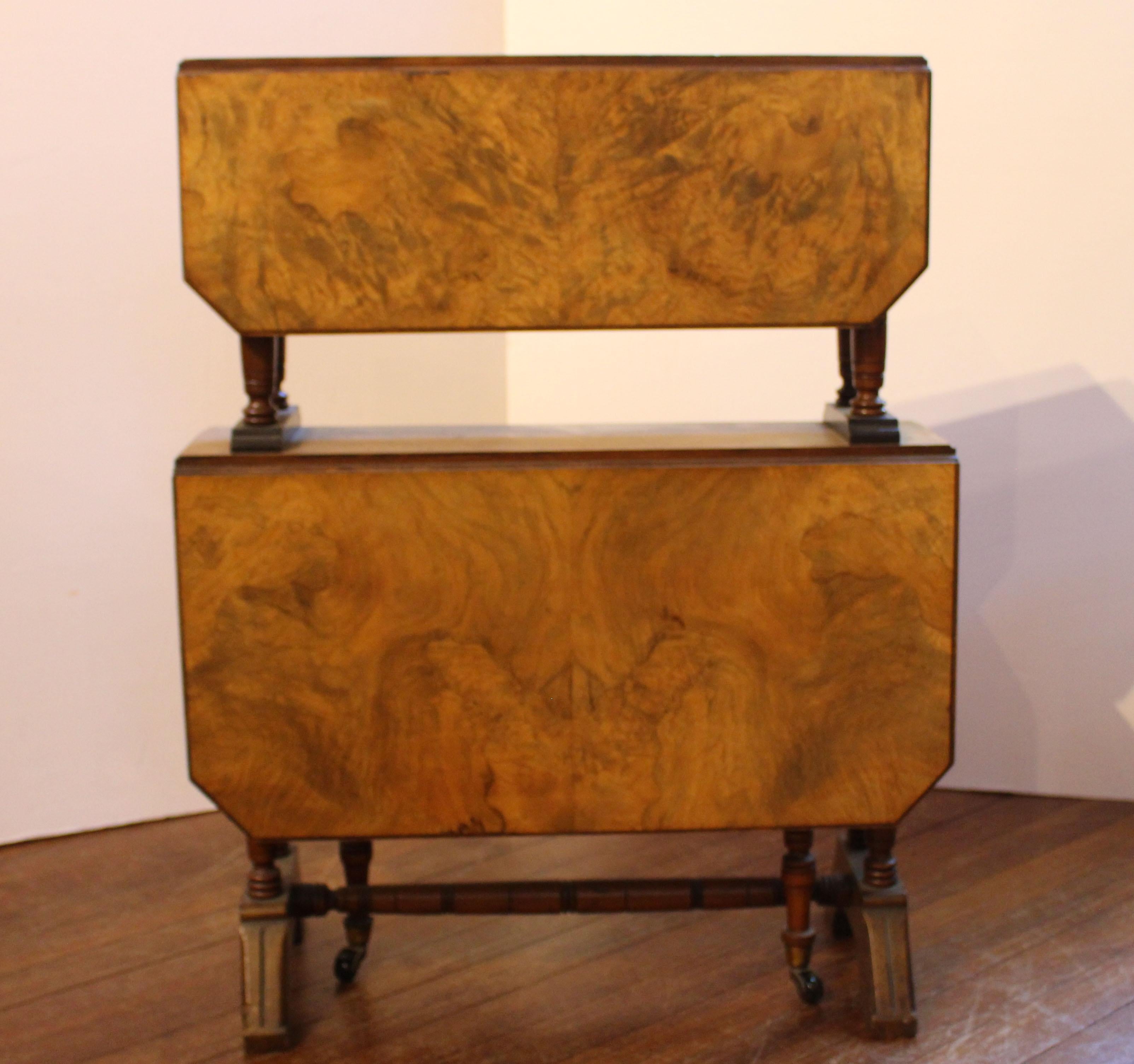 A rarely found double Sutherland table. English, late 19th century. Walnut & Circassian walnut tops. Well turned & ring carved legs & supports. Molded tops with canted corners.

Whitehall Antiques is a family business that has been a major source