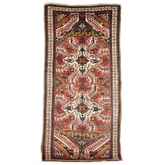 Late 19th Century, Red Field and Ivory Pattern, Wool Caucasian Eagle Kazak Rug