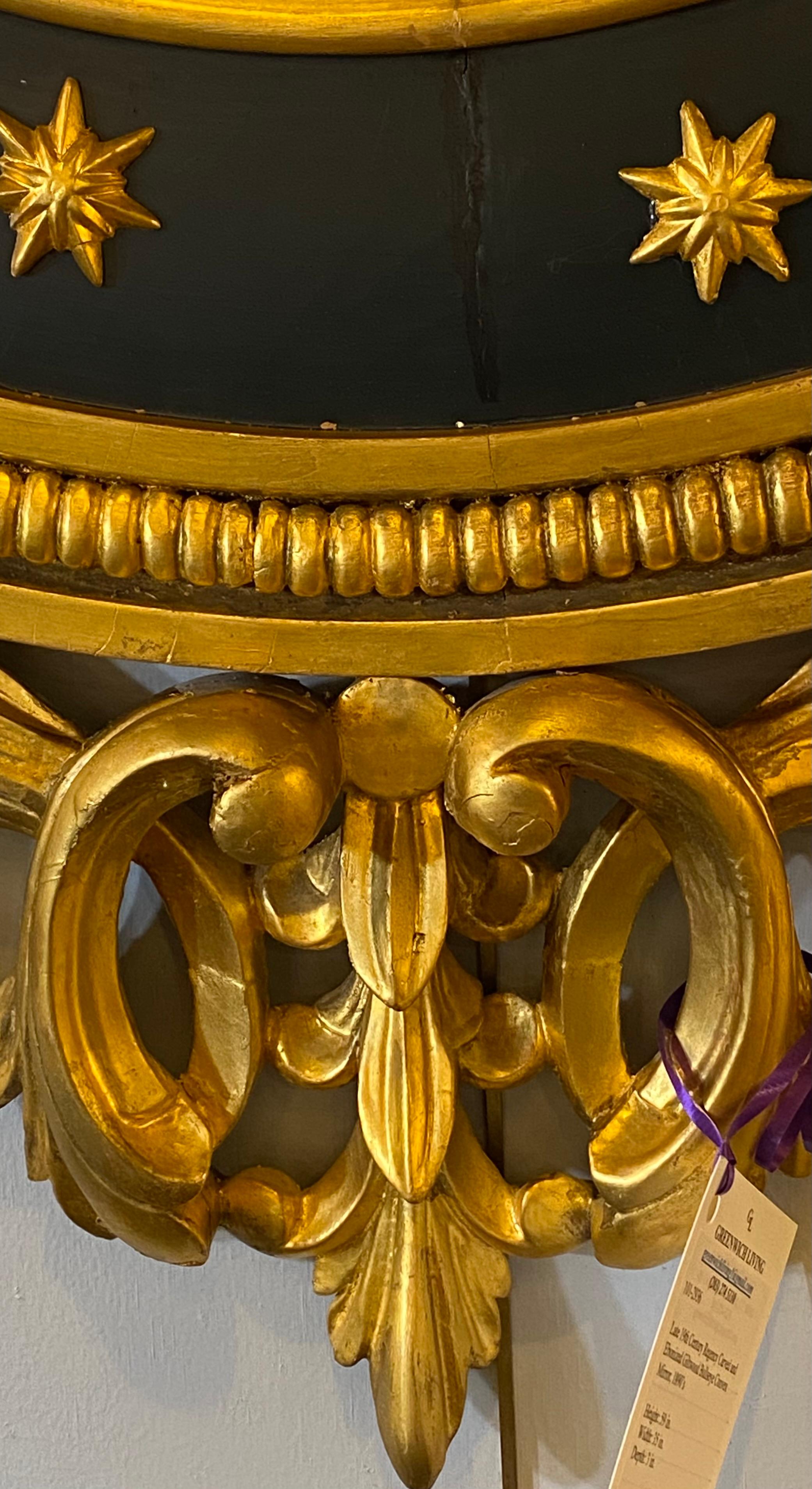 Konvexer geschnitzter und ebonisierter Bullseye-Spiegel aus vergoldetem Holz, Regency-Stil, spätes 19. Jahrhundert im Angebot 5
