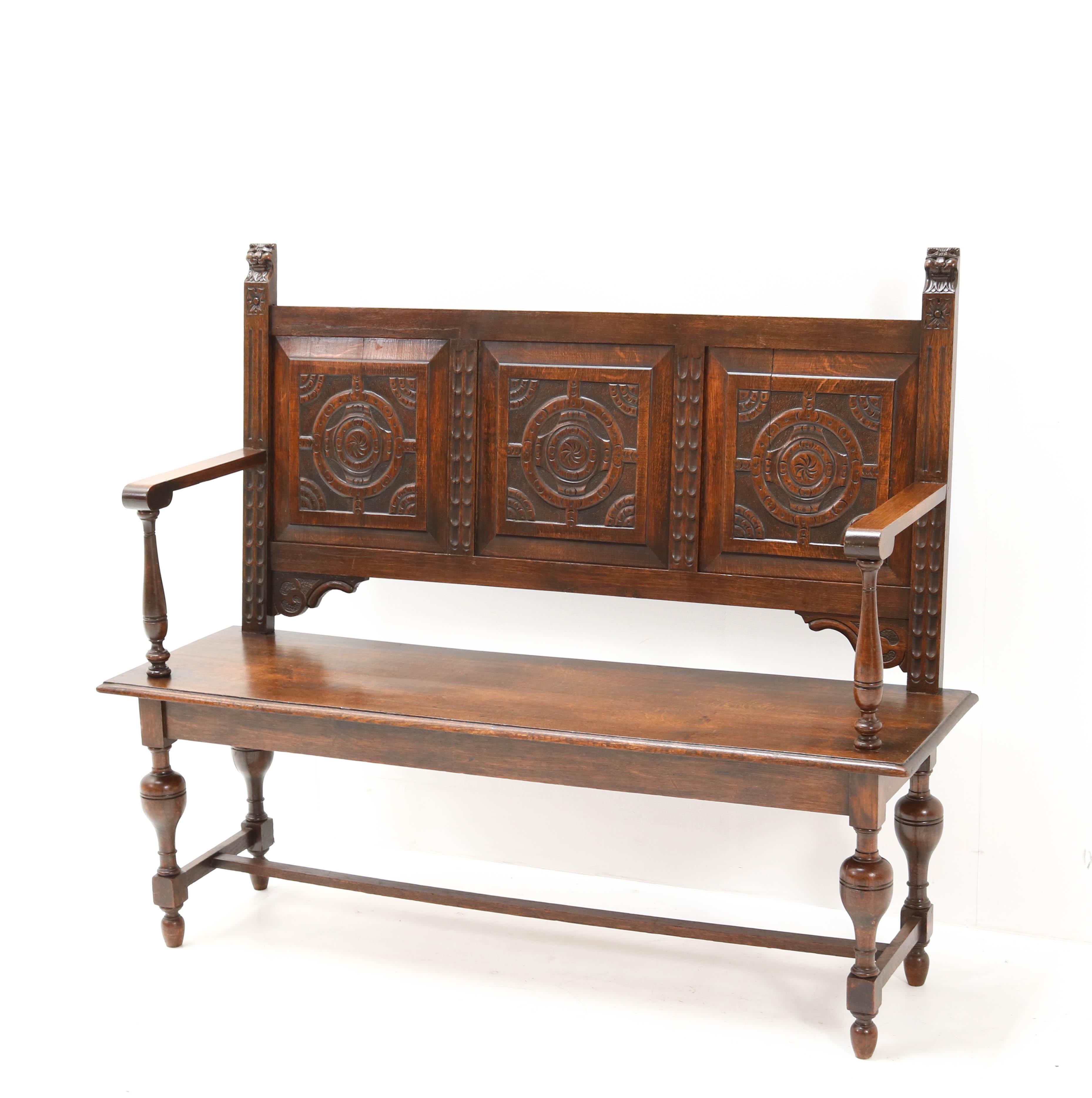 Wonderful Renaissance style hall bench.
Striking Dutch design from the late 19th century.
Solid oak with carved lion heads and carved panels.
In very good condition with a beautiful patina.
