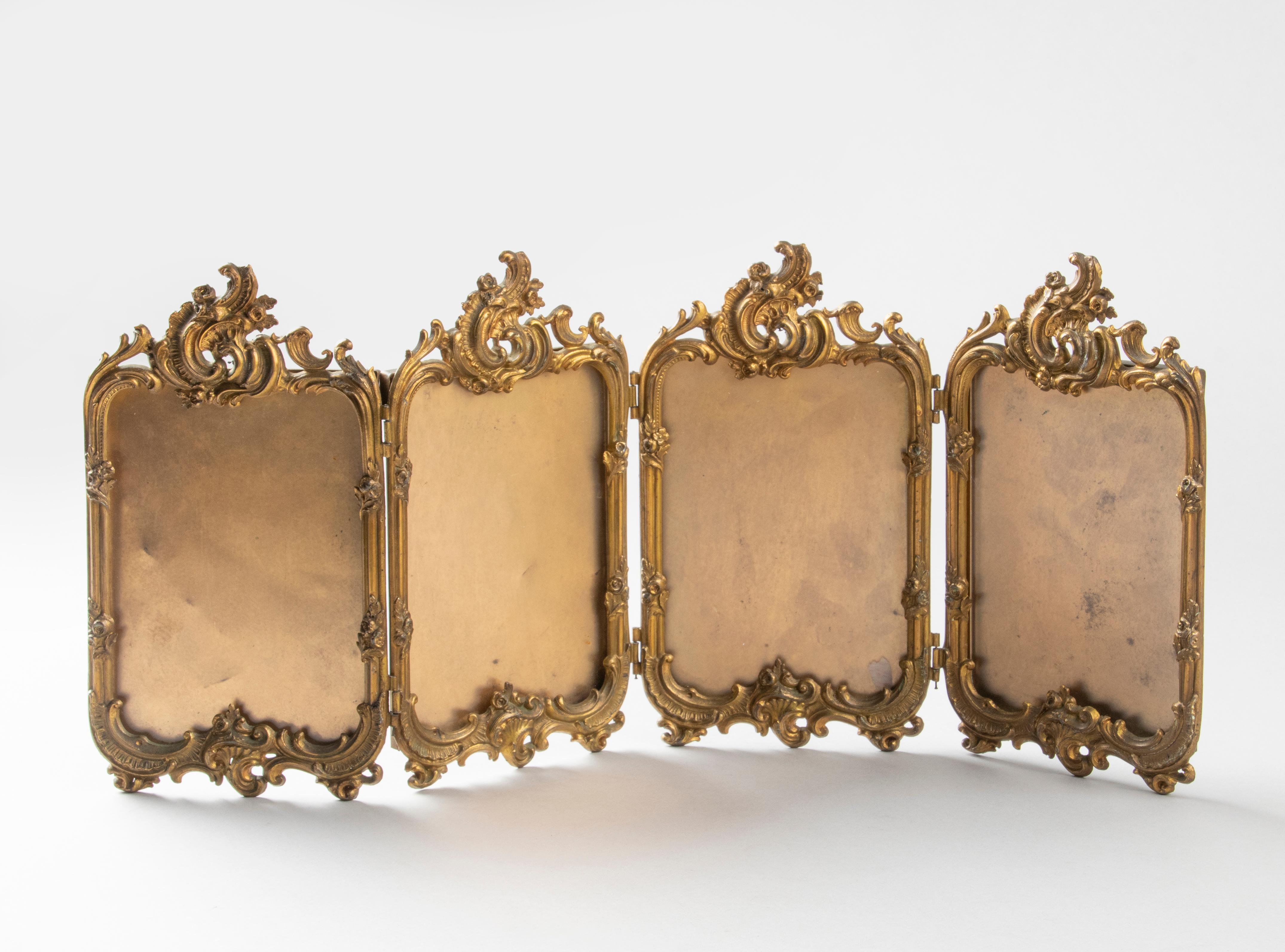 Beautiful antique photo frame, with room for four photos. The frame is made of gold colored brass in rococo style. The frames are attached to each other with hinges, so you can place the frame in different positions. Each frame is fitted with glass,