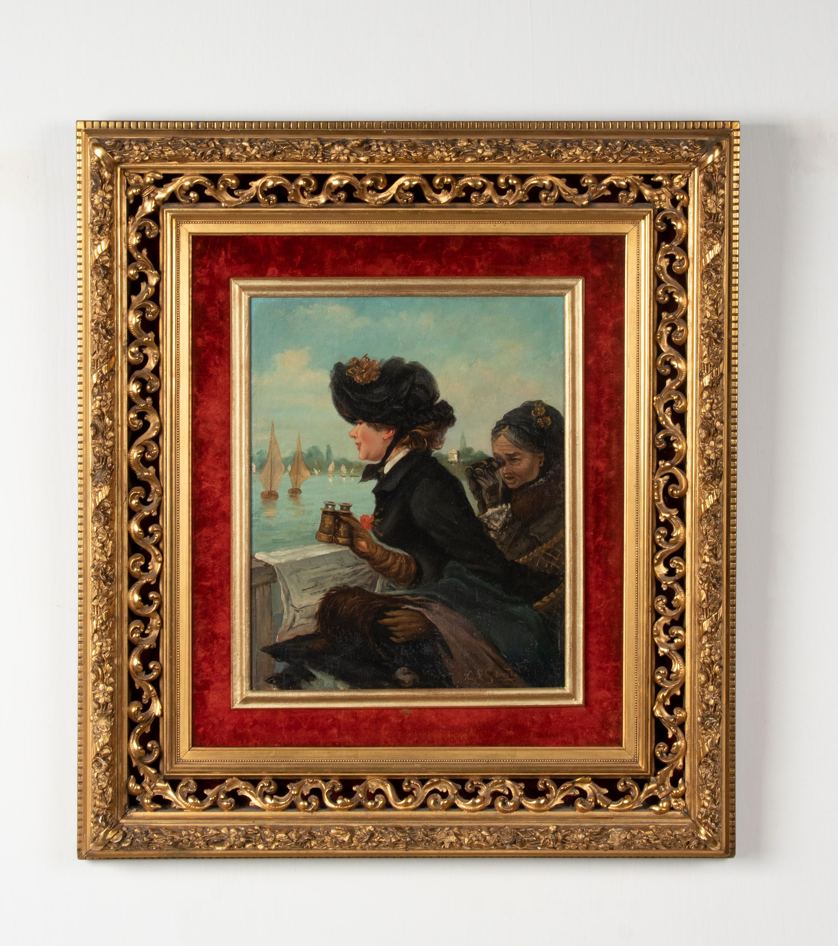 A romantic painting depicting two women sitting on the shore of a lake, looking at the sailboats. It is painted with oil on canvas. The painting is signed with E.L. Garrido. However, this painting was not painted by this Spanish master. But the