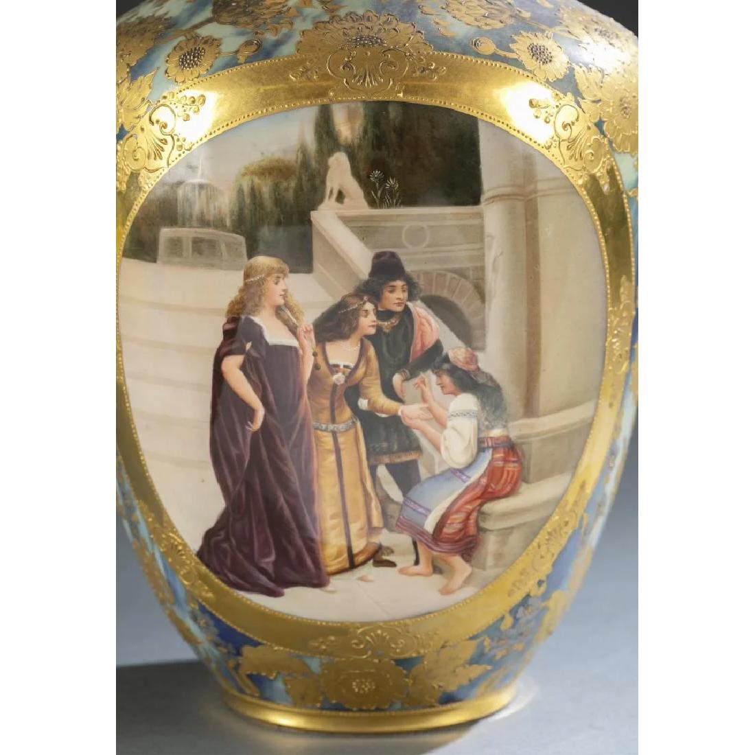 An exquisite a Royal Vienna porcelain vase depicting a fortune teller. Marbled blue and green with gold gilt floral design. Image in window of three women with fortune teller on stairs. Mark on bottom. Stamped 