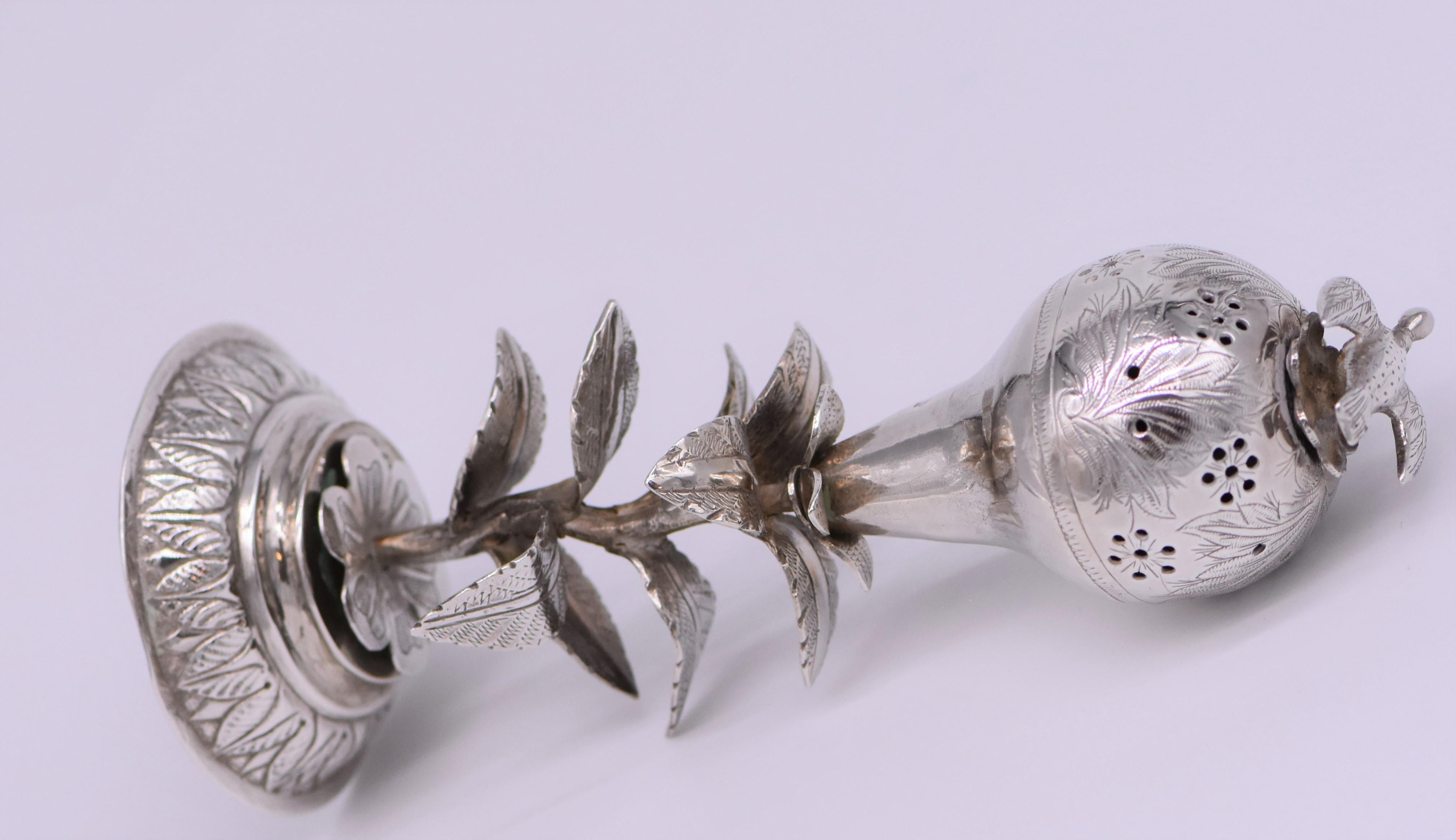 Handmade silver spice container, Russian Empire, circa 1880. 
On a round base with vine shaped stem that leads to engraved upper fruit form portion. 
Topped with a bird finial. 
Marked with Russian silver hallmarks. 

Every item in Menorah Galleries