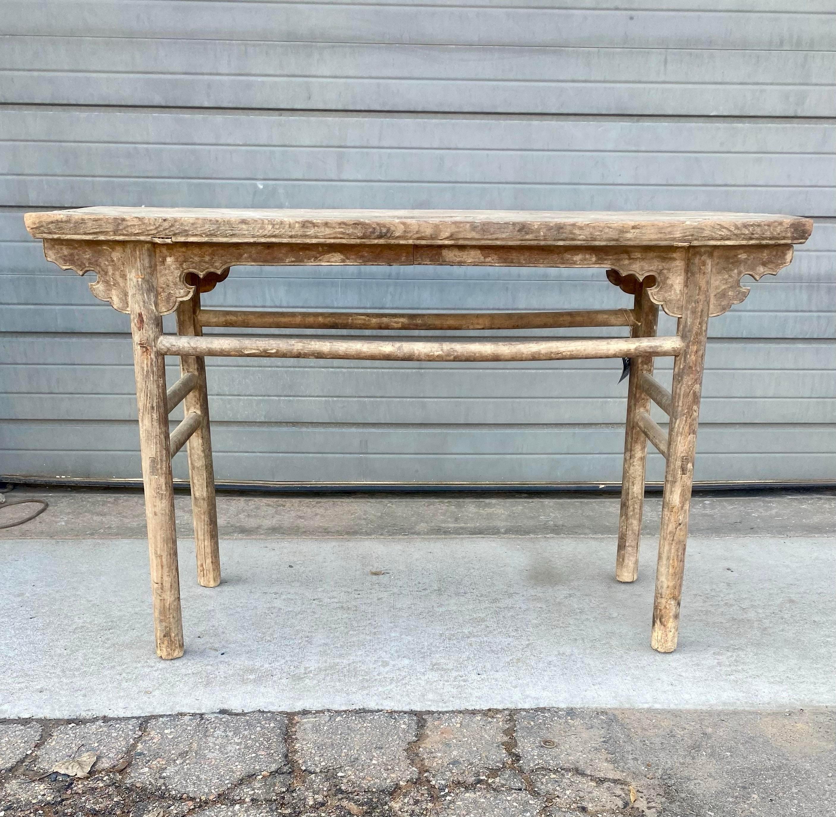 Rustic Asian table with aged raised graining which adds texture to the rustic appearance. Traditional form with upraised ends, ‘cloud’ motif scrolled decoration to the aprons on either side. Great for entry, side table or bathroom