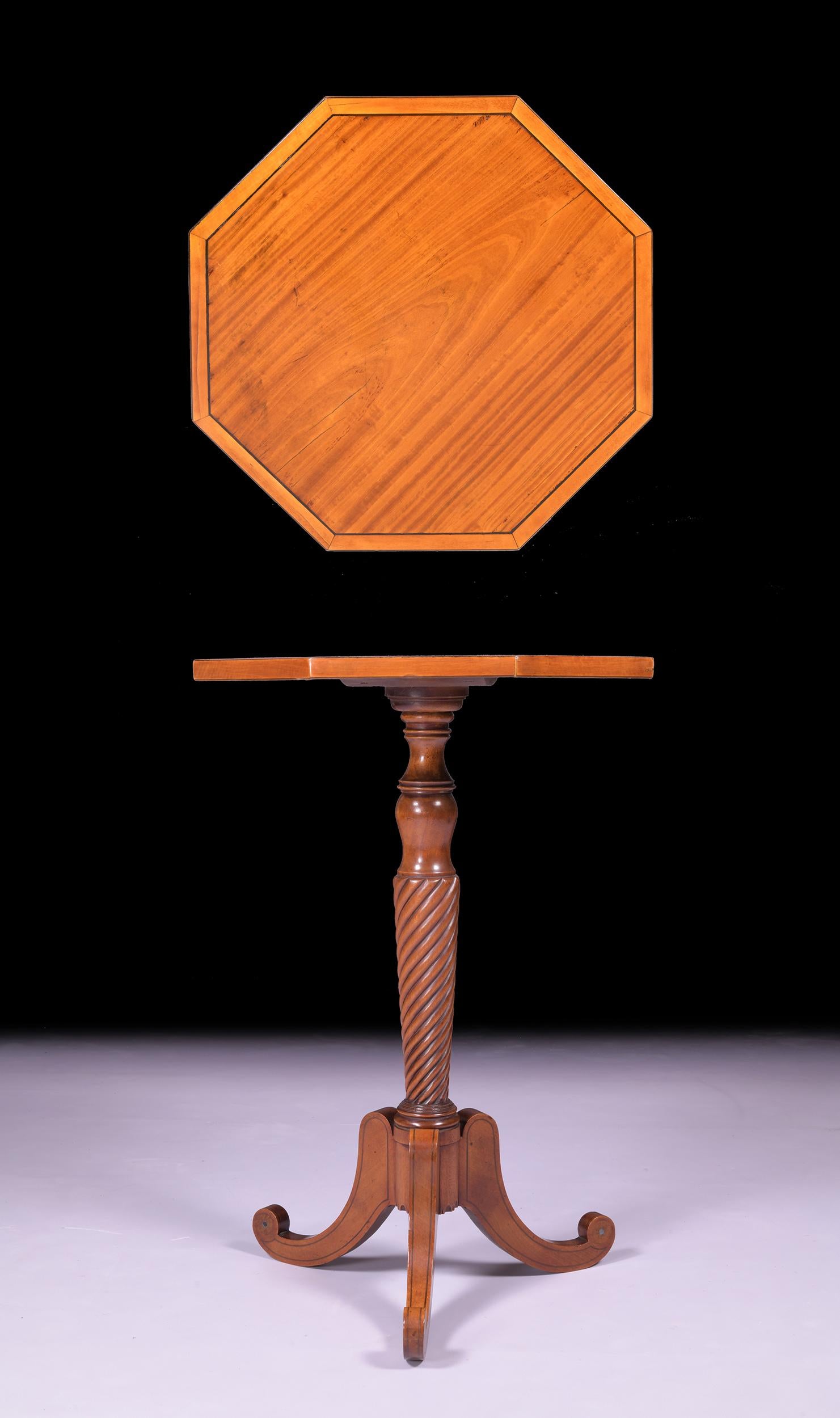 A fine and elegant late 19th century Satinwood octagonal shaped occasional table, raised on a baluster column with three S-scroll legs.

Circa 1880

English