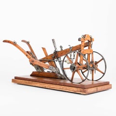 Late 19th century scale model of a horse drawn single farrow plough