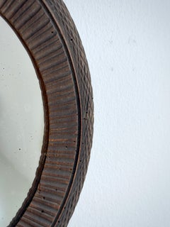 Late 19th century scandinavian art and craft mirror. Decorated oak frame.