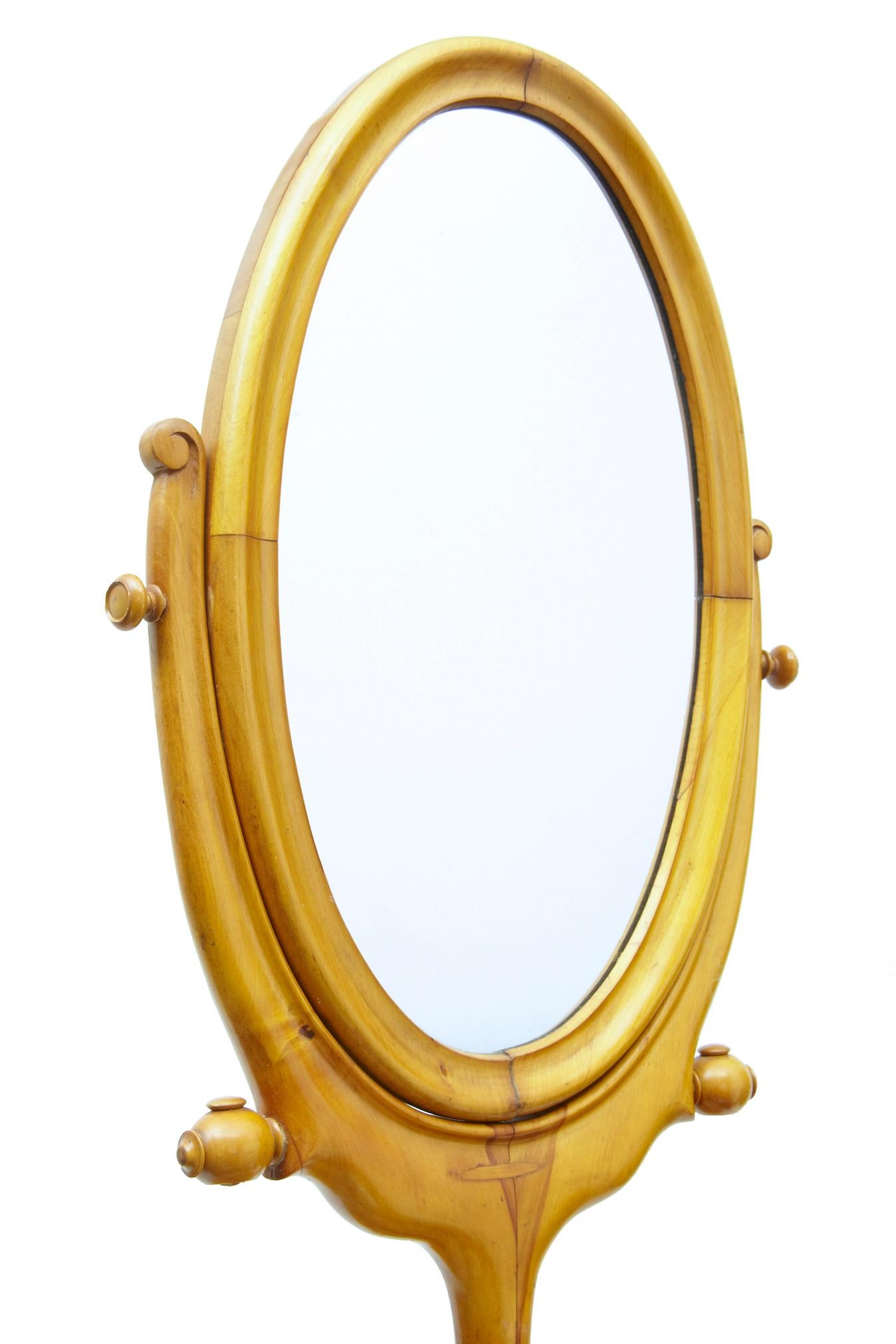Late 19th century Scandinavian birch shaving mirror stand, circa 1890.

Unusual piece which would be ideal for use as a shop fitment or for the home. Oval mirror with tilting capabilities and height adjustment. Mirror links to a circular top with