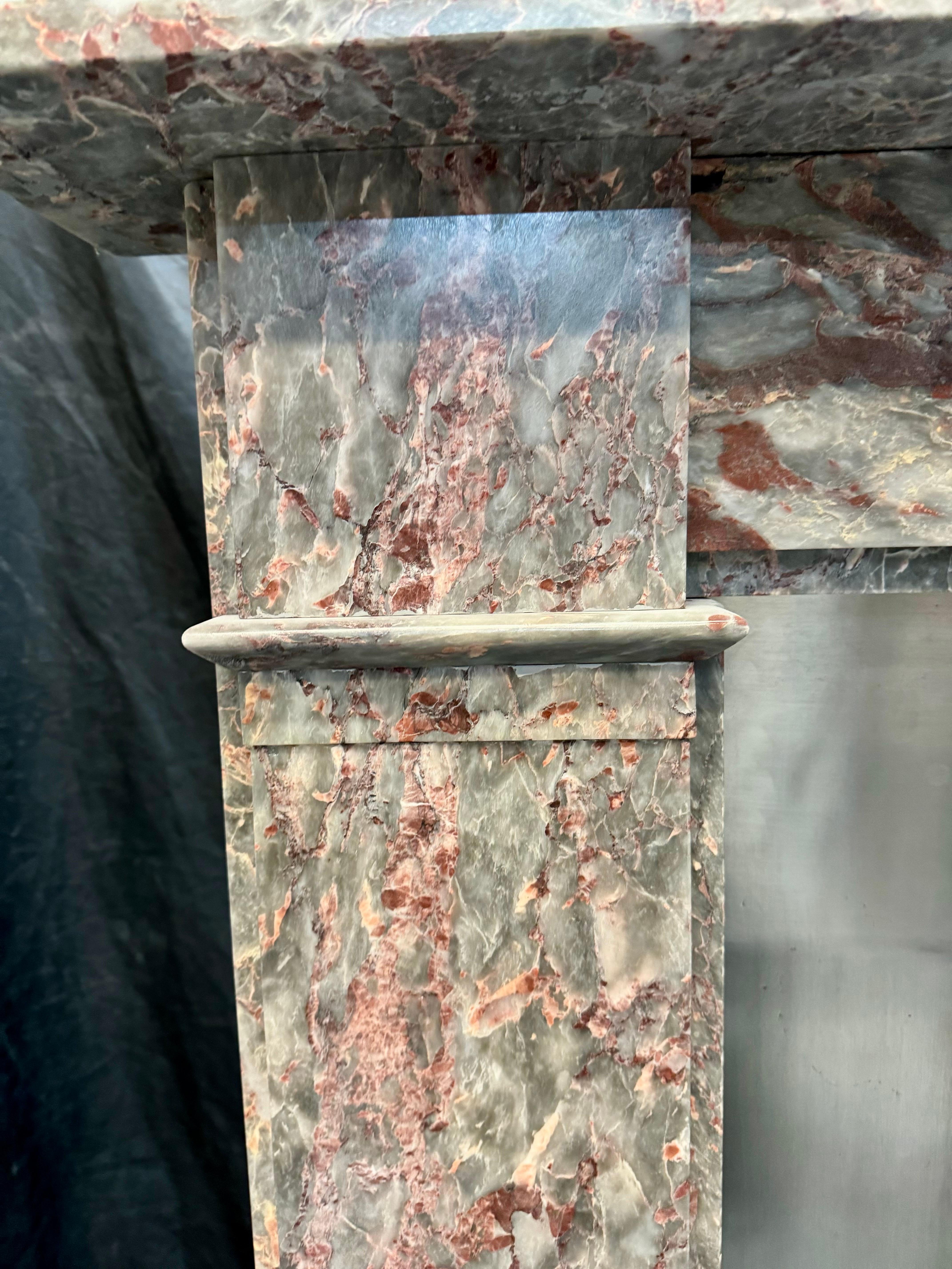 Carved Late 19th Century Scottish Fior Di Pesco Marble Fireplace Surround. For Sale