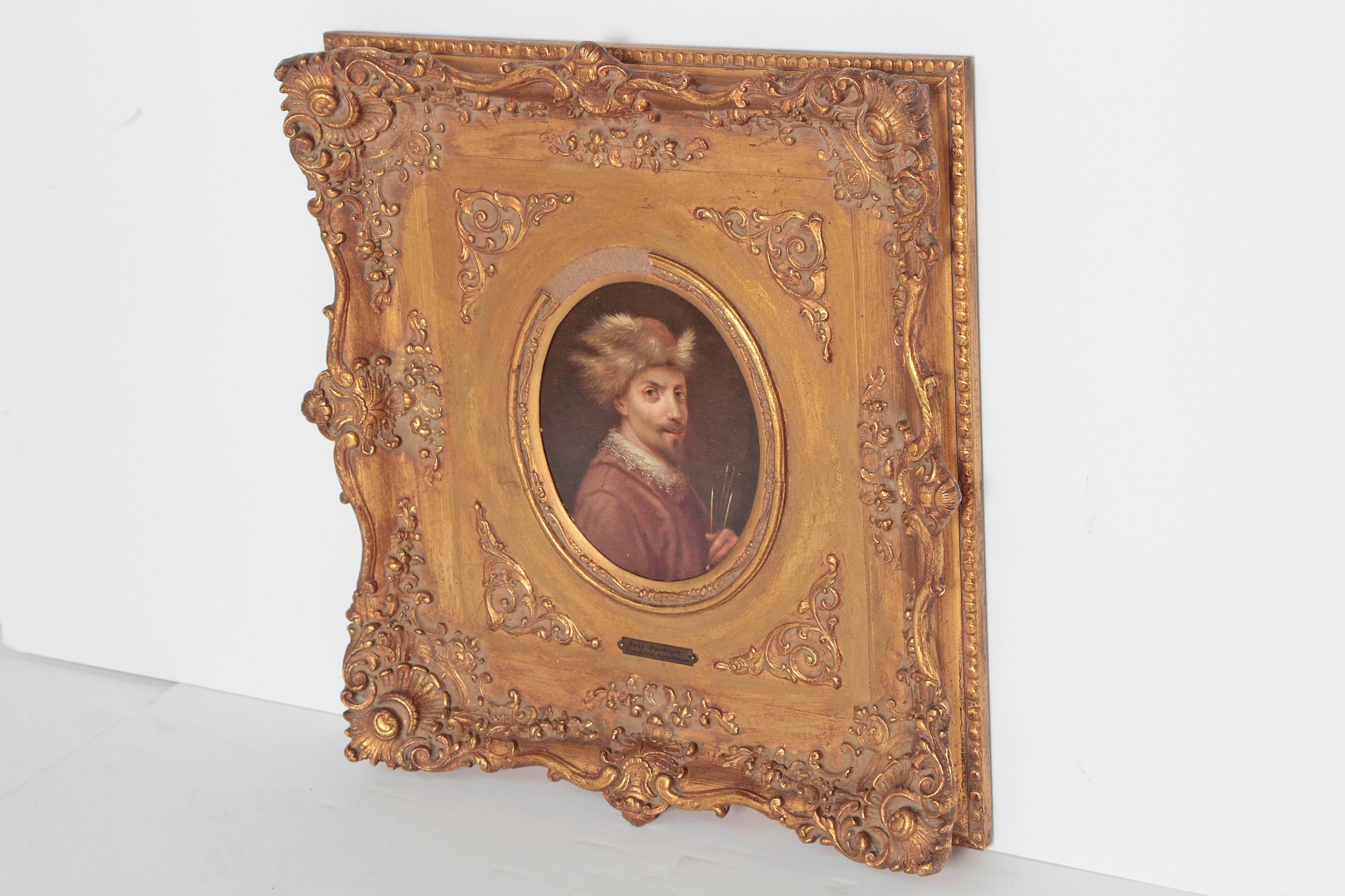 An oil on board self portrait in three quarter pose of a man in fur hat and collar.  Framed in very elaborate decorative carved gilt frame.  Continental school.  Attributed to  Isidor Kaufmann, (1853-1921, Hungarian), but not authenticated. Kaufmann