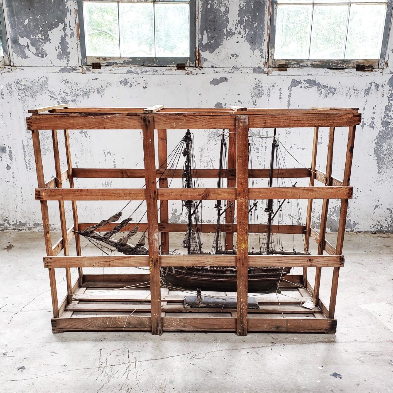 Late 19th century ship's model in crate.
We like the look of this in the crate. Amazing hung on the wall as a sculpture.