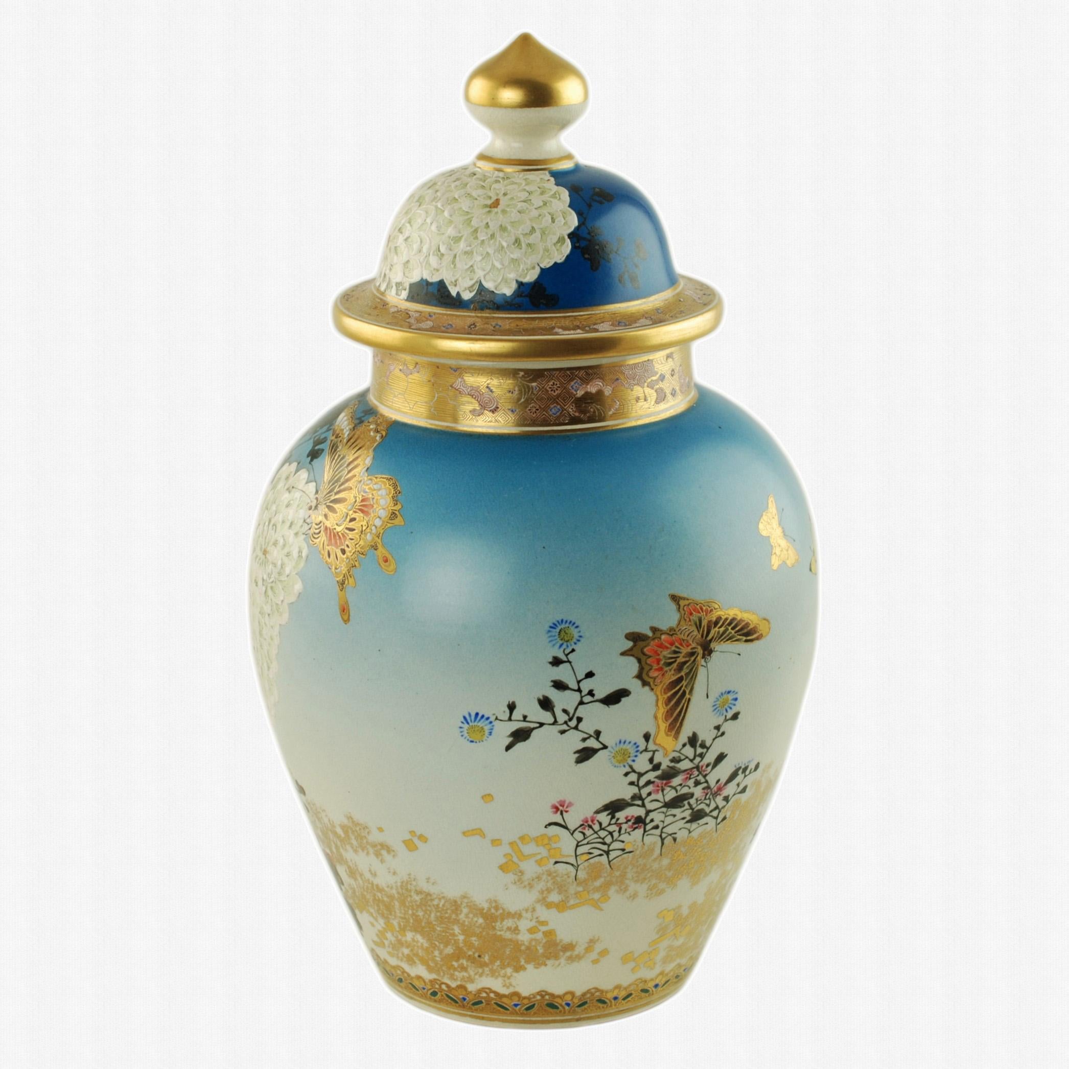 This outstanding late 19th century Japanese Satsuma porcelain covered temple jar has a traditional form with a domed lid. The piece features exquisite hand painted decoration which includes brightly hued flowers and associated foliage along with