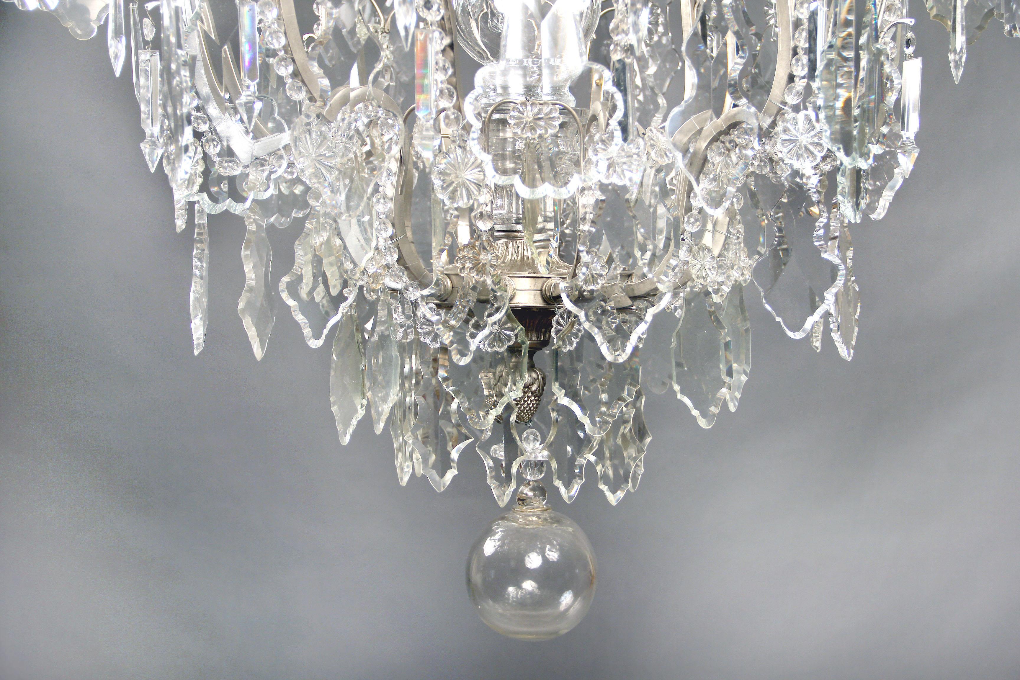 Late 19th Century Silvered Bronze and Crystal Eight Light Chandelier For Sale 1
