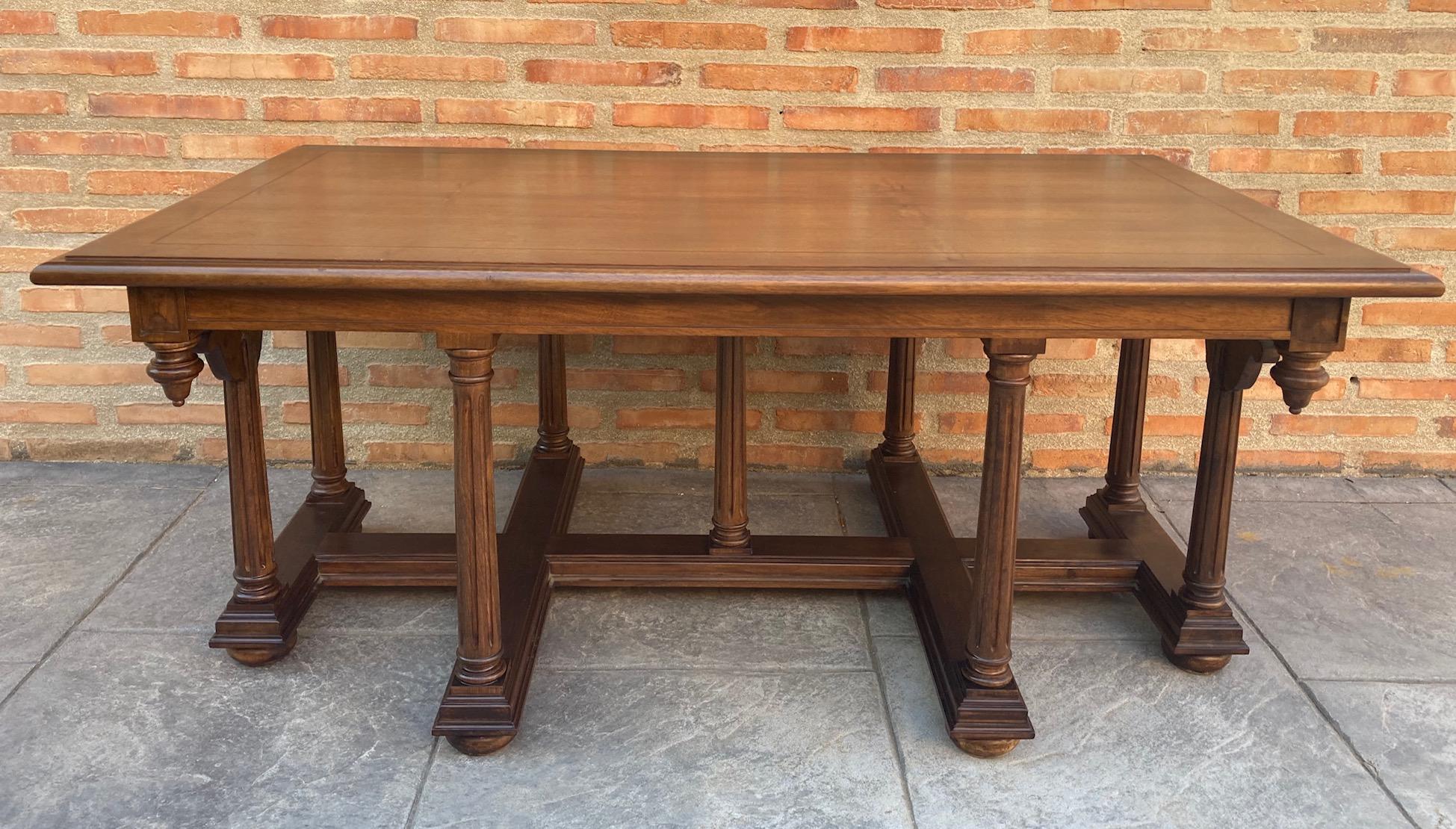 Spanish church table or altar from the 19th century with wooden columns and top with a fine line of hand carved marquetry.

An unusual shape with a nice shiny patina. Good size for a coffee or side table. Funny carved stands with a profiled edge