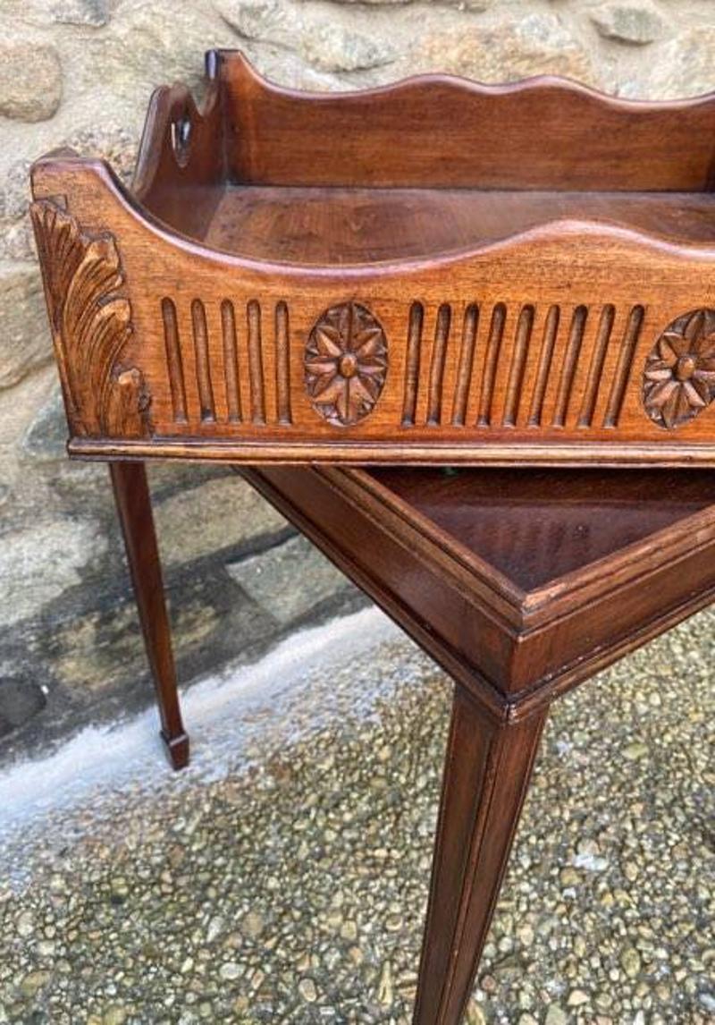 Late 19th century square wooden tray table with removable tray.
Removable tray has lovely carving work on top and has green felt on bottom to prevent table scratching. Perfect for displaying your prettiest wine and liquor decanters. This piece came