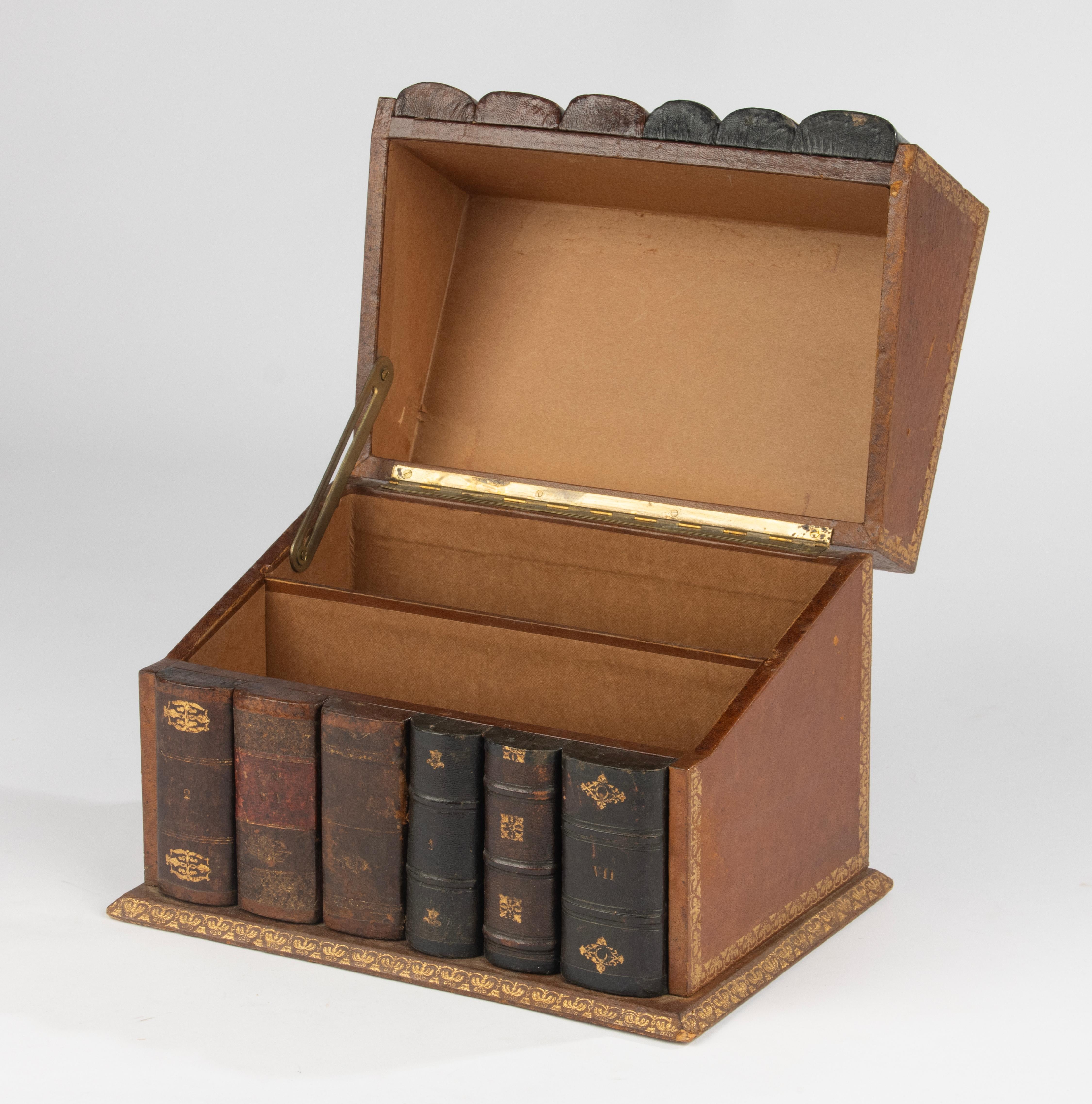 Charming late 19th-century French stationery or letter box, cleverly designed in the form of a stack of antique leather-bound books. This trompe-l’œil piece was crafted with great attention to detail, featuring gilt tooling, simulated spines with