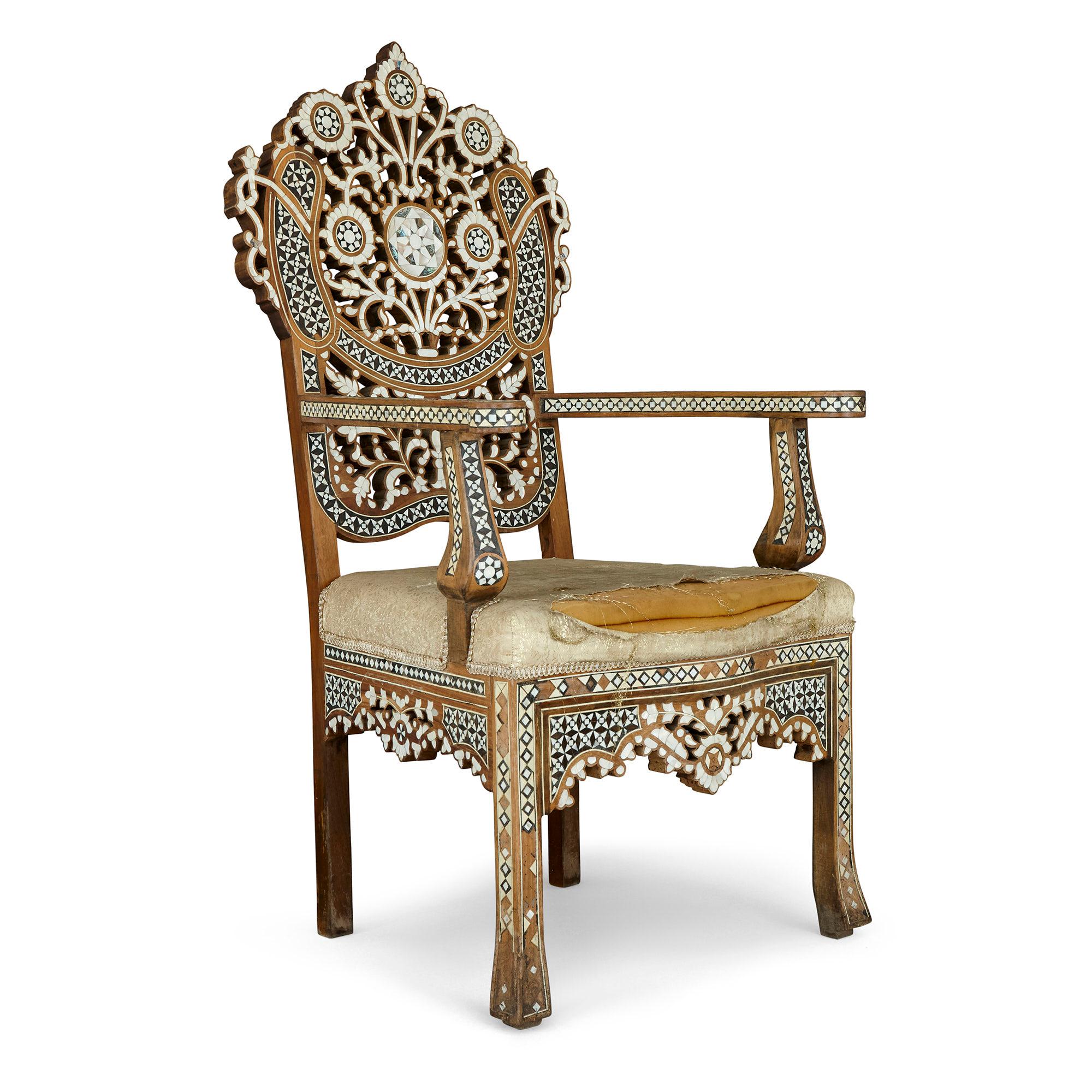 Late 19th Century Syrian chair with arabesque mother-of-pearl and abalone inlays
Syrian, late 19th Century
Dimensions: Height 120cm, width 63cm, depth 50cm

Crafted in the distinctive Syrian style, this beautiful armchair is profusely decorated