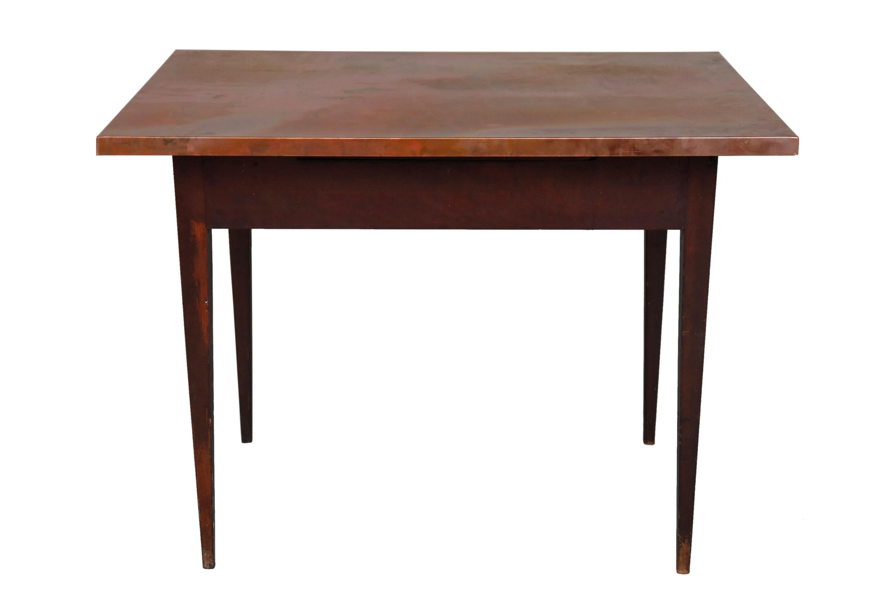 Spare and elegant lines, with original wooden base finish. Copper top has been created for the table.