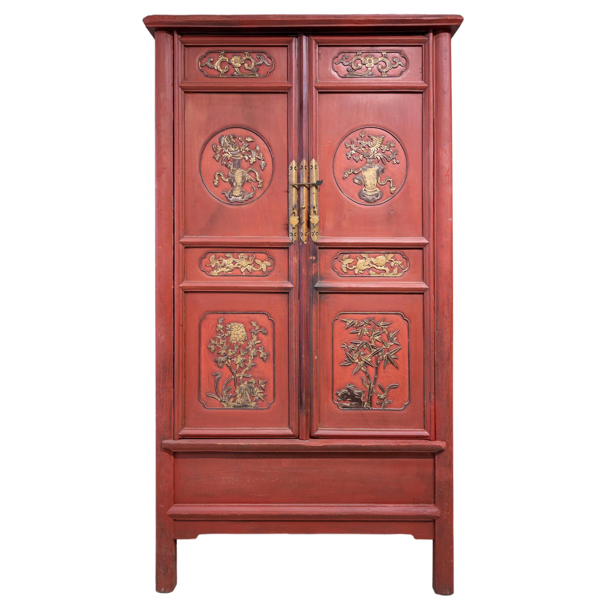 Late 19th Century Tall Tapered Red & Gold Carved Cabinet For Sale