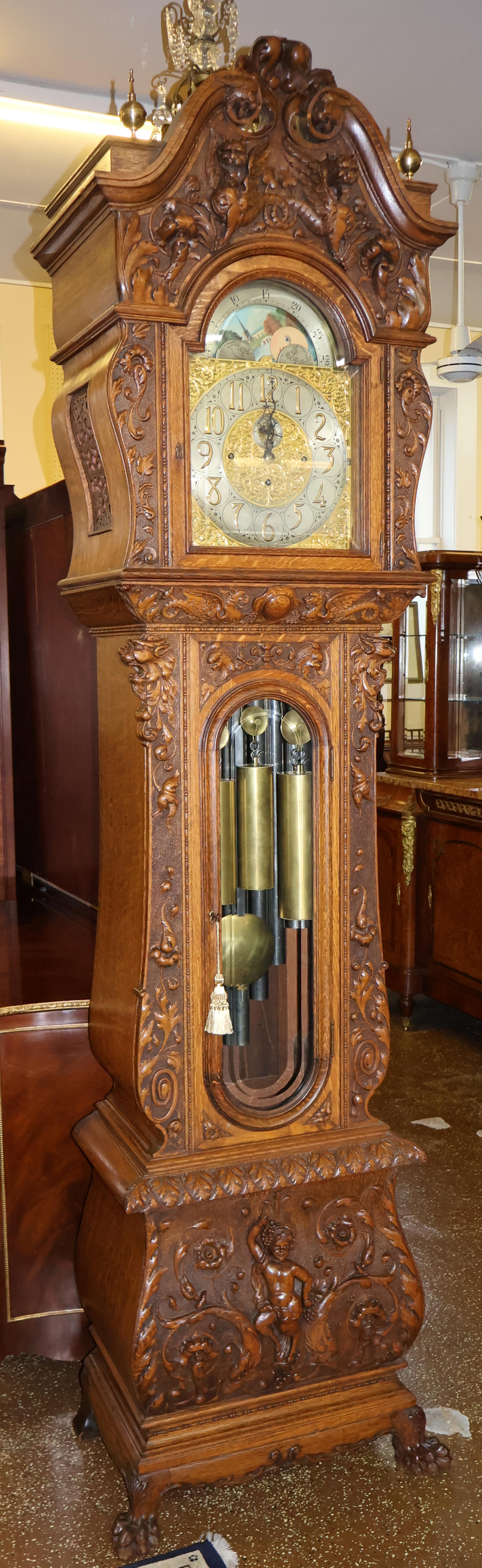 Late 19th Century Tiger Oak Horner Tall Case Grandfather Clock Elliot Movement

Dimensions : 24