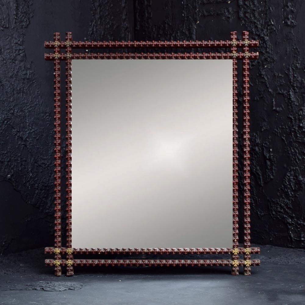 Late 19th century tramp art mirror 
We share what we love, and we love this naïve yet highly decorative example of a late 19th Century American tramp art mirror frame. We have recently added a high-quality new mirror plate, however the frame shows