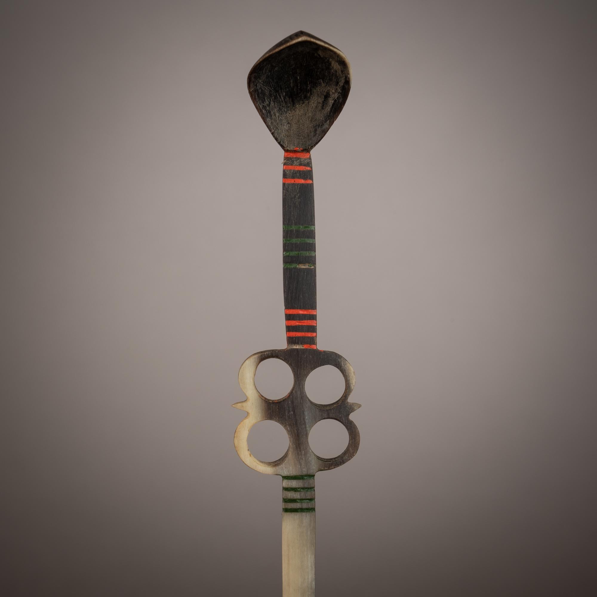 South African artistry, answering the needs of both utility and style, applied its remarkable approach to design in snuff paraphernalia that doubled as eye-catching accessories. These two thin snuff spoons were worn as hairpins, beautifying their
